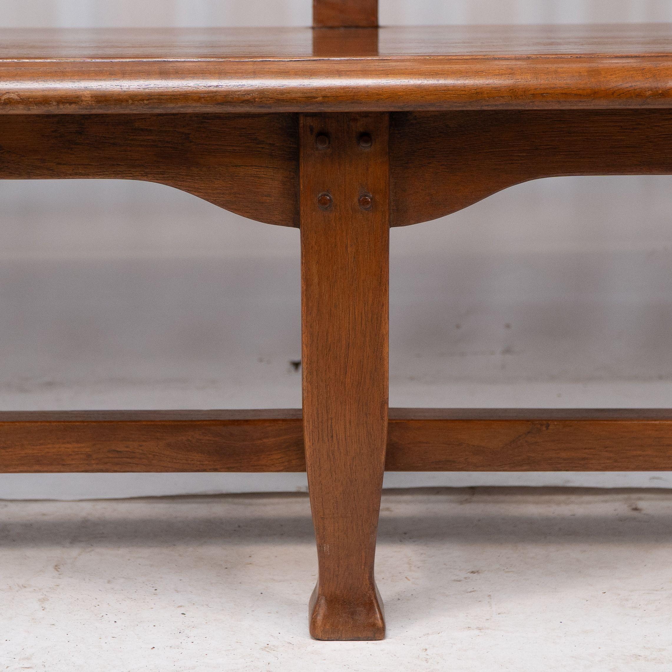 An Arts and Crafts super quality teak hall bench in the style of Arthur Simpson For Sale 6