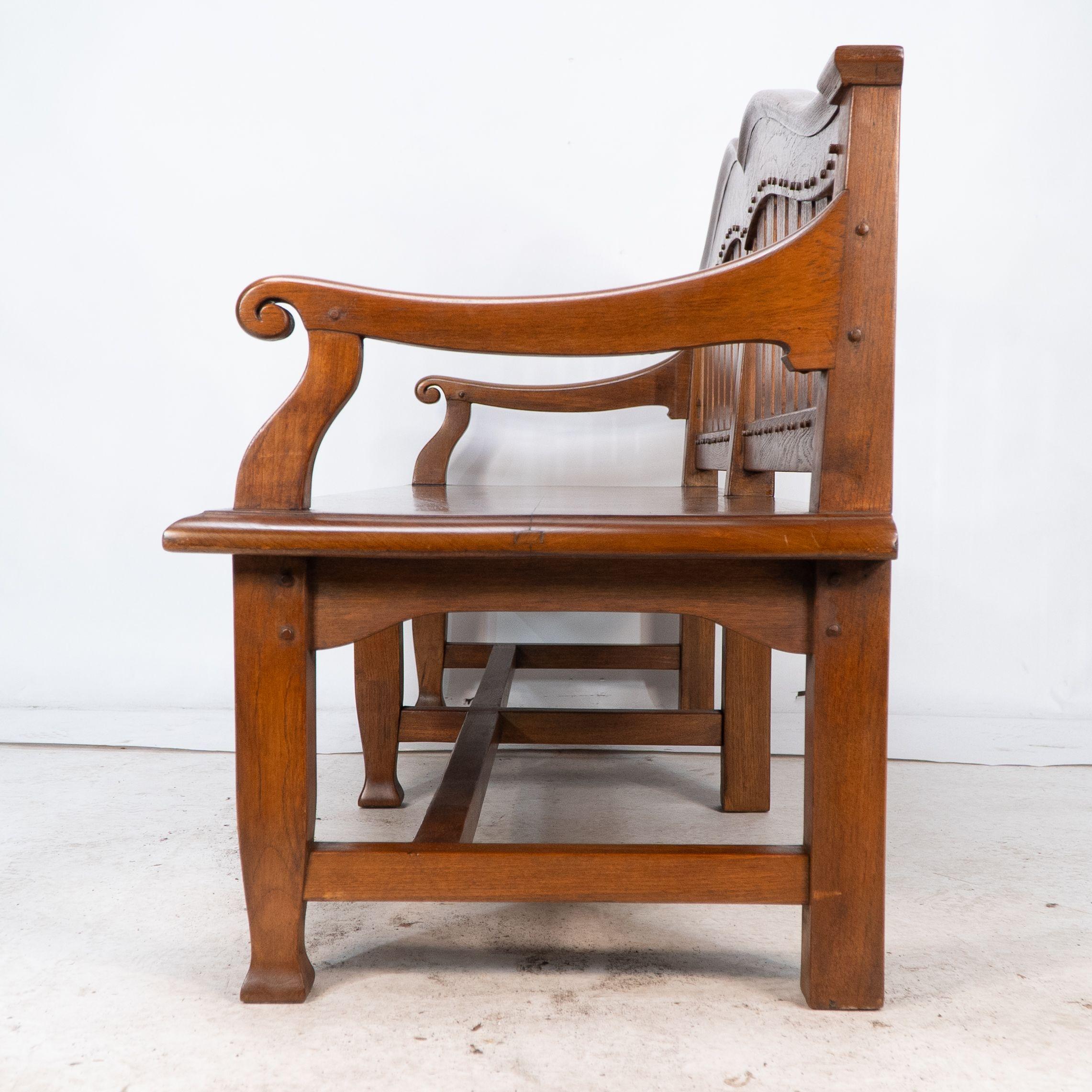 An Arts and Crafts super quality teak hall bench in the style of Arthur Simpson For Sale 8
