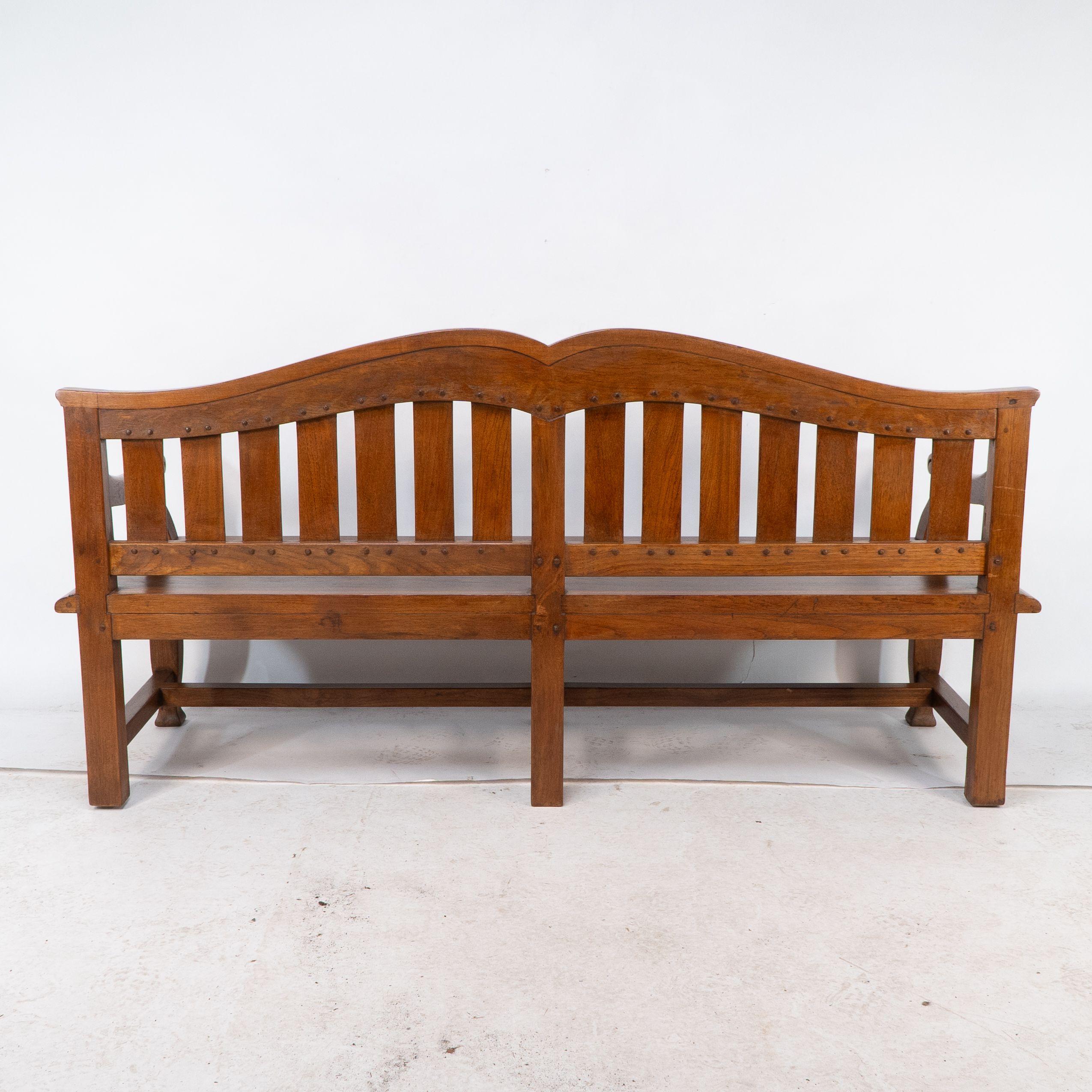 An Arts and Crafts super quality teak hall bench in the style of Arthur Simpson For Sale 9