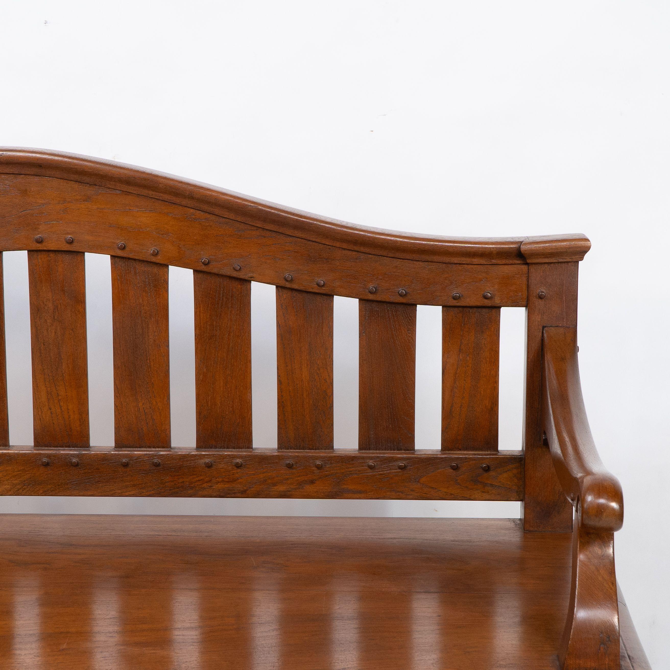 Teak An Arts and Crafts super quality teak hall bench in the style of Arthur Simpson For Sale
