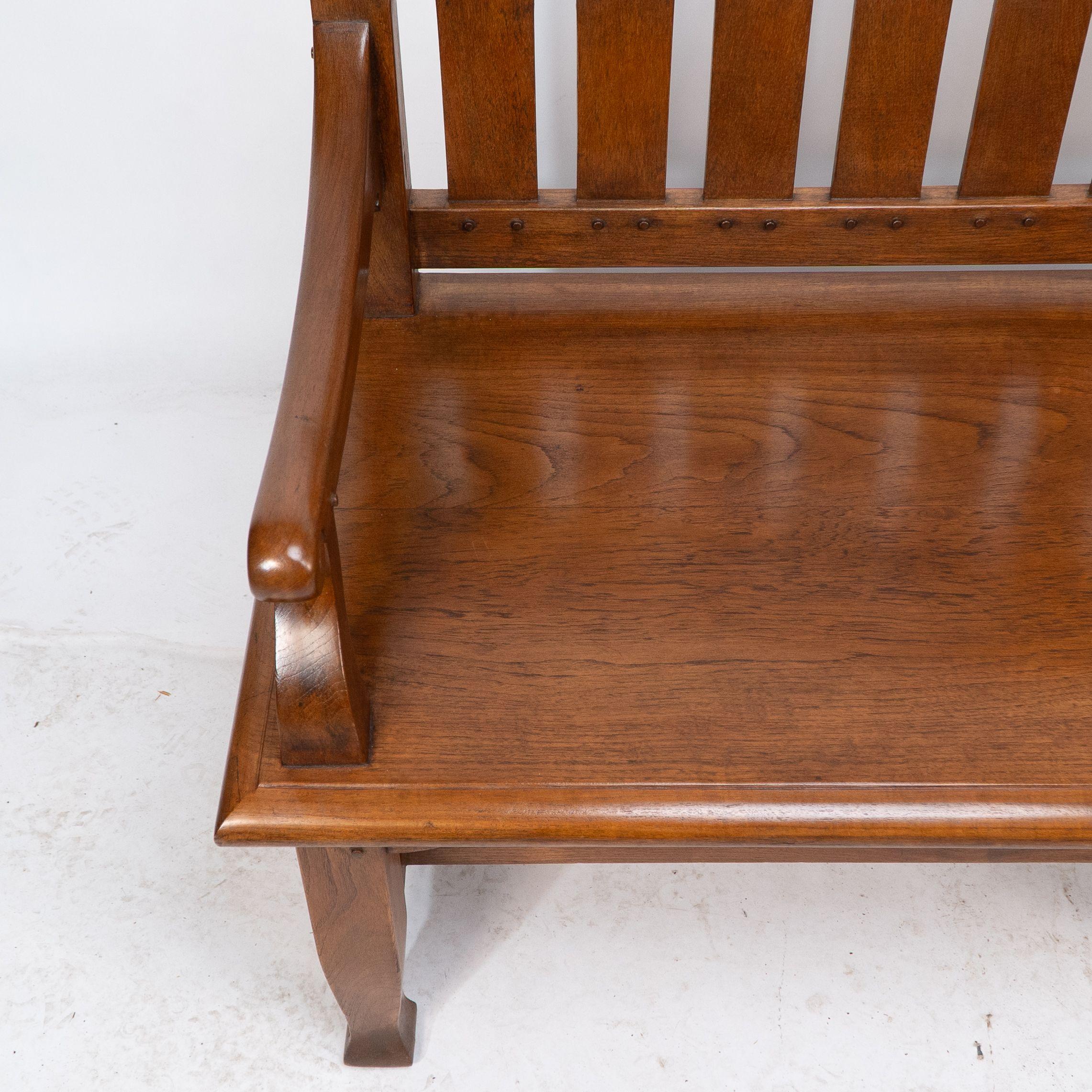 An Arts and Crafts super quality teak hall bench in the style of Arthur Simpson For Sale 2