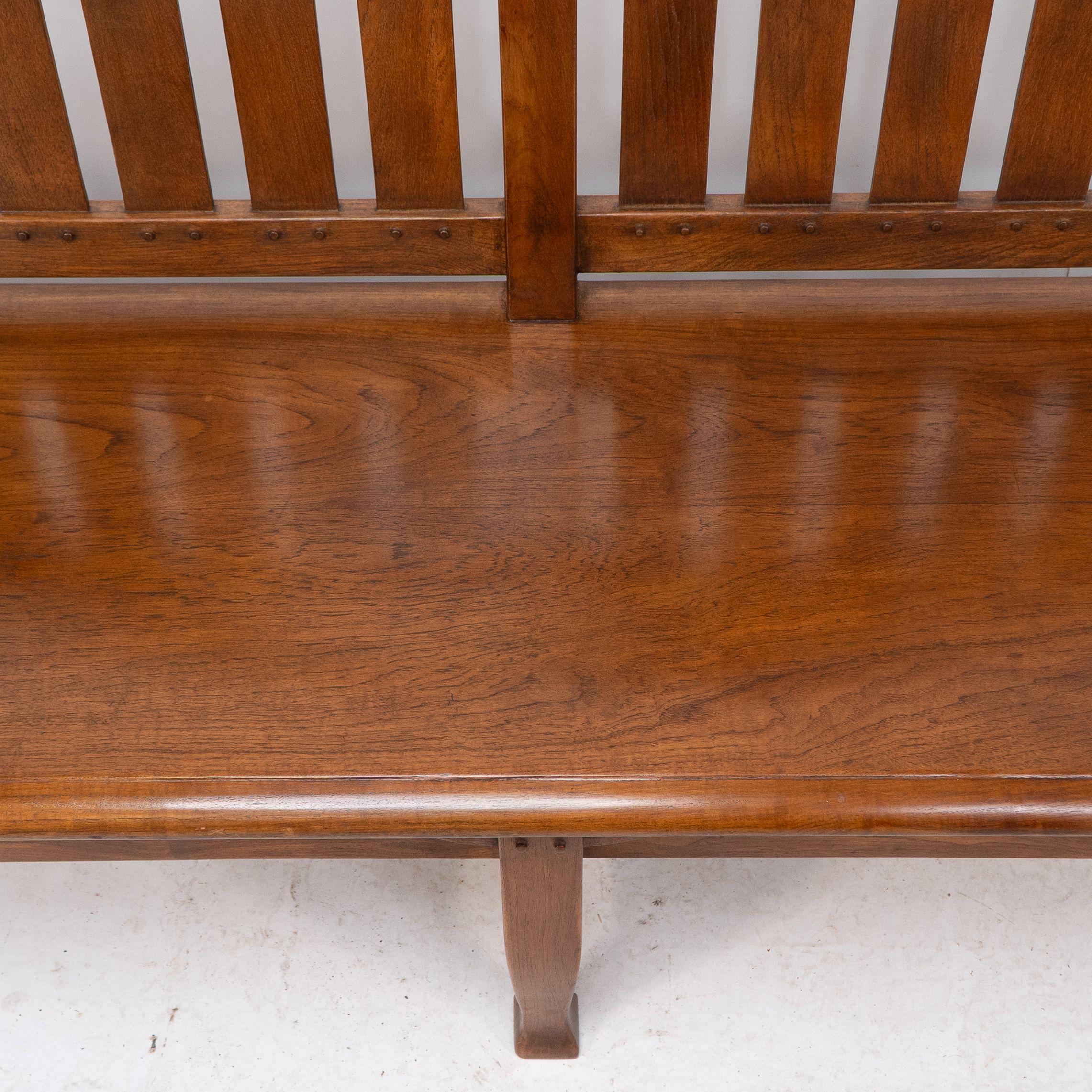 An Arts and Crafts super quality teak hall bench in the style of Arthur Simpson For Sale 3