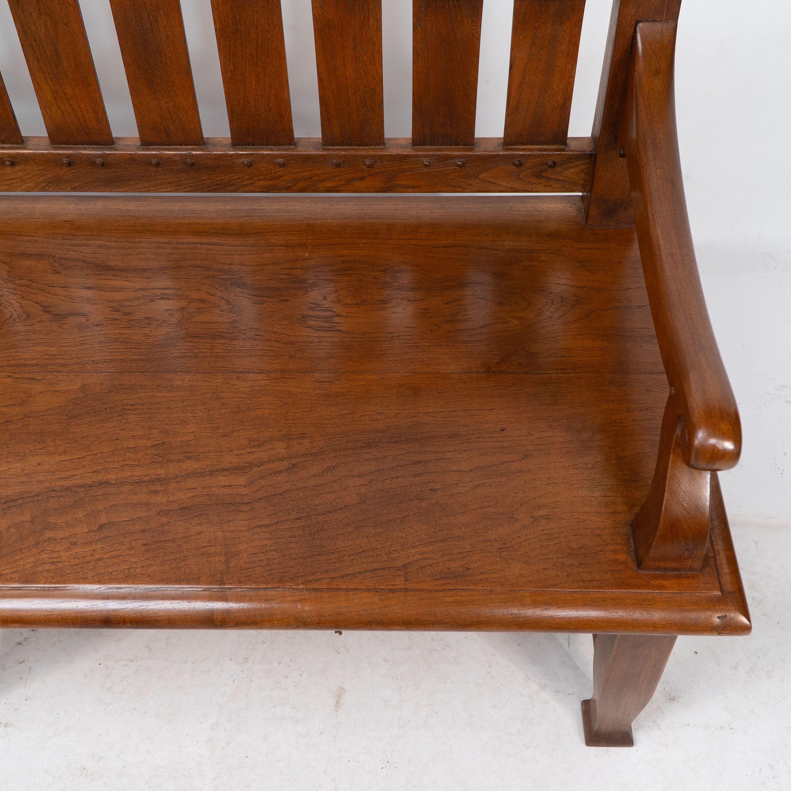 An Arts and Crafts super quality teak hall bench in the style of Arthur Simpson For Sale 4