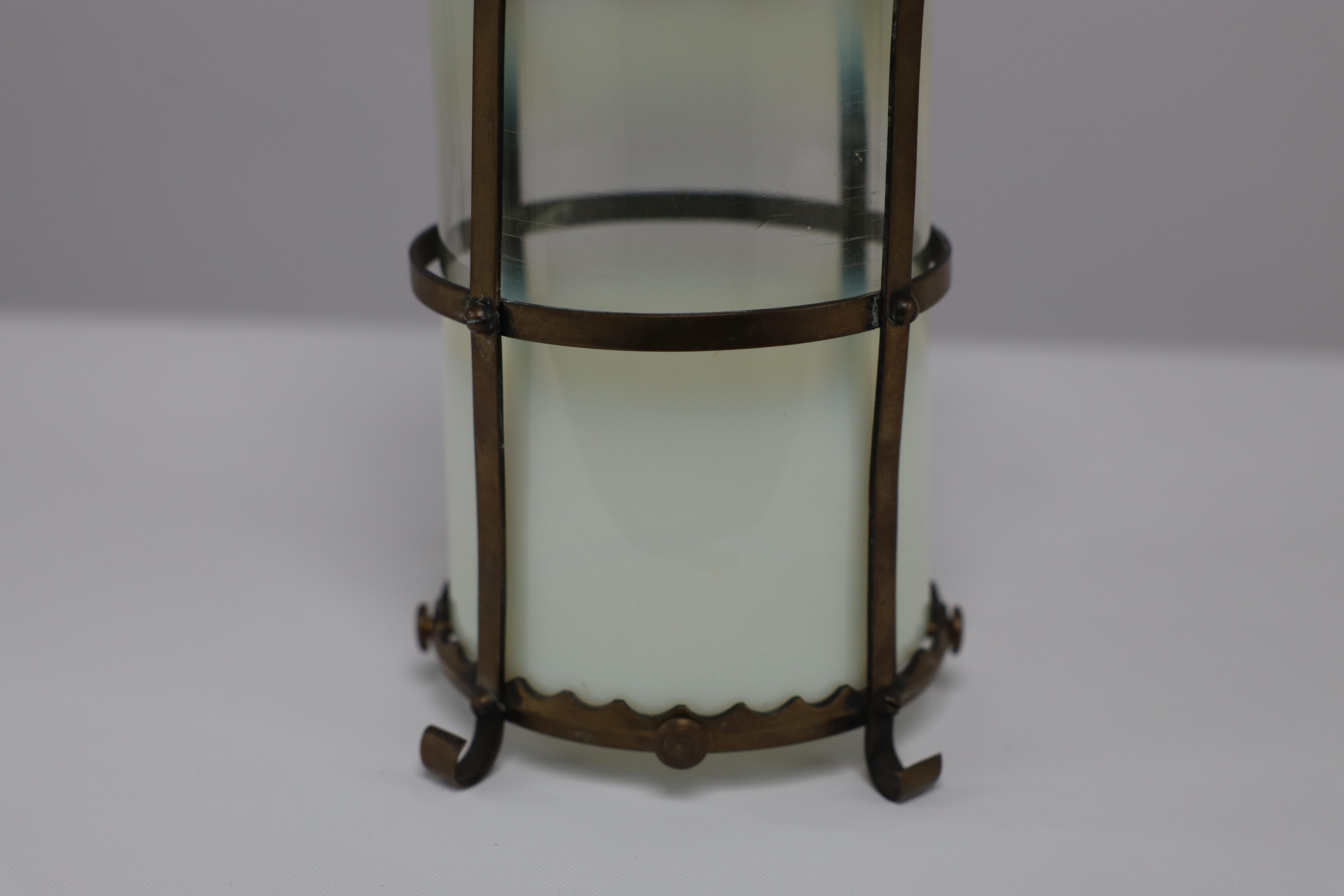 An Arts & Crafts brass ceiling lantern with the original vaseline shade 6
