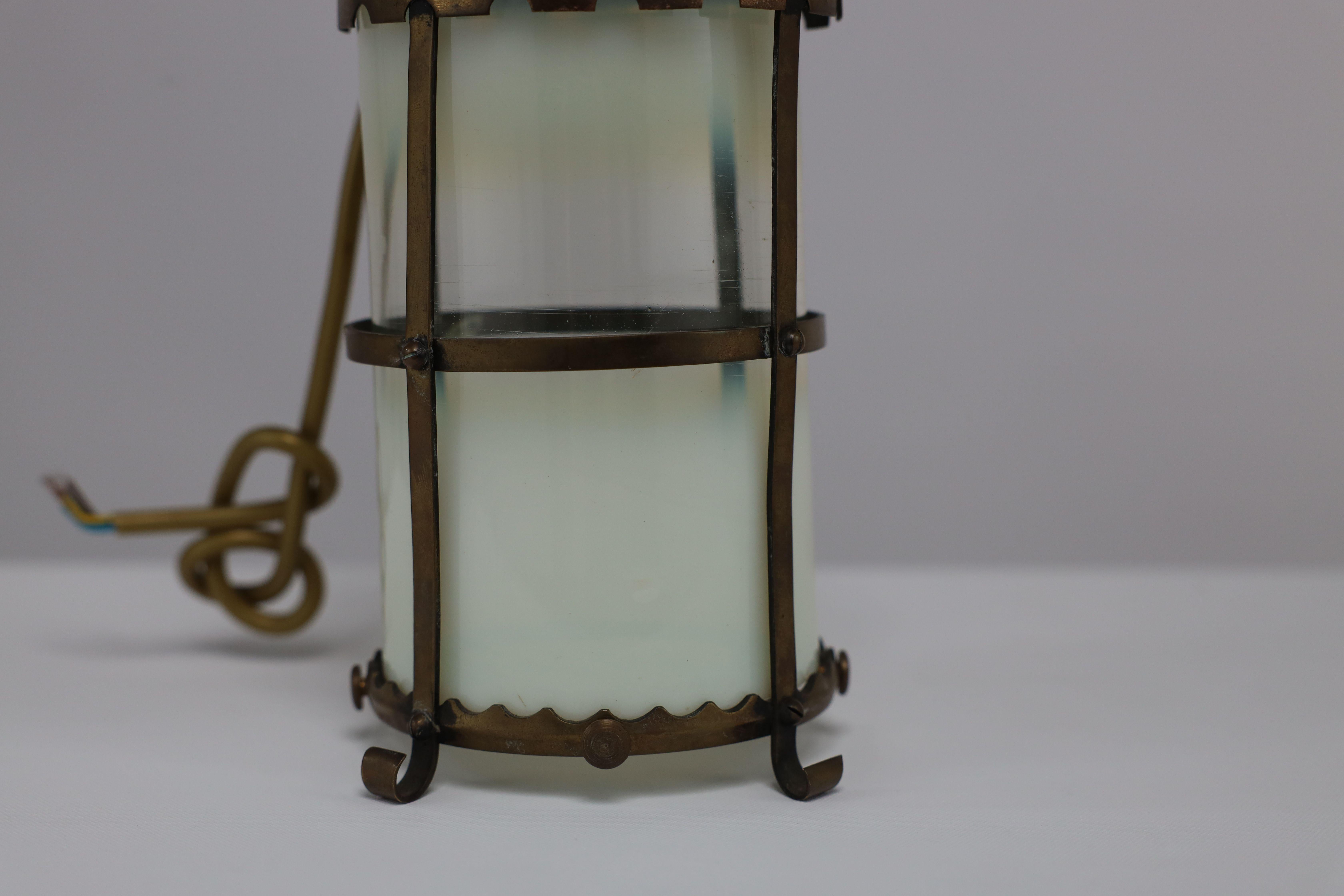 Brass An Arts & Crafts brass ceiling lantern with the original vaseline shade