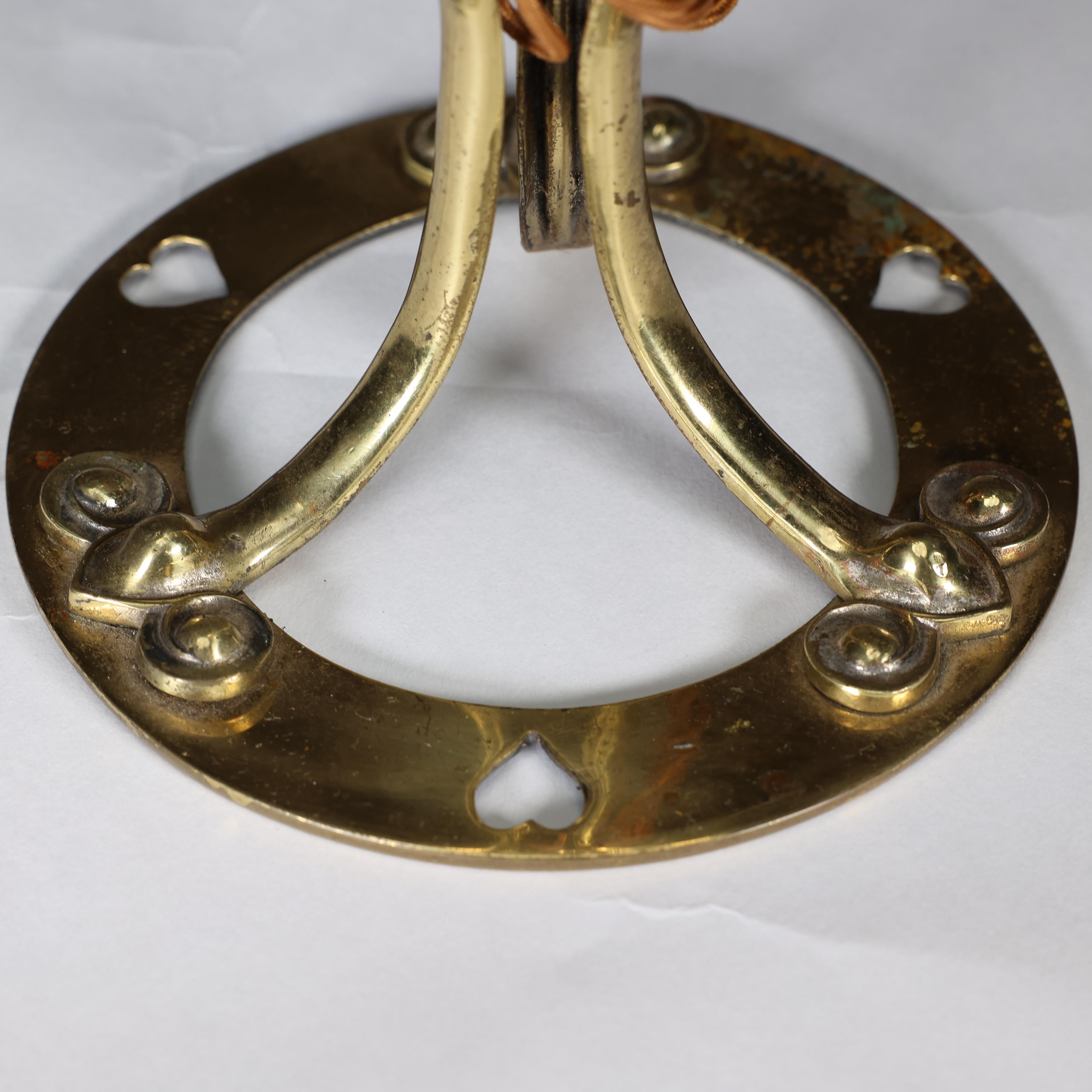 An Arts & Crafts brass table lamp tulip shaped with heart cut-outs to the base For Sale 8