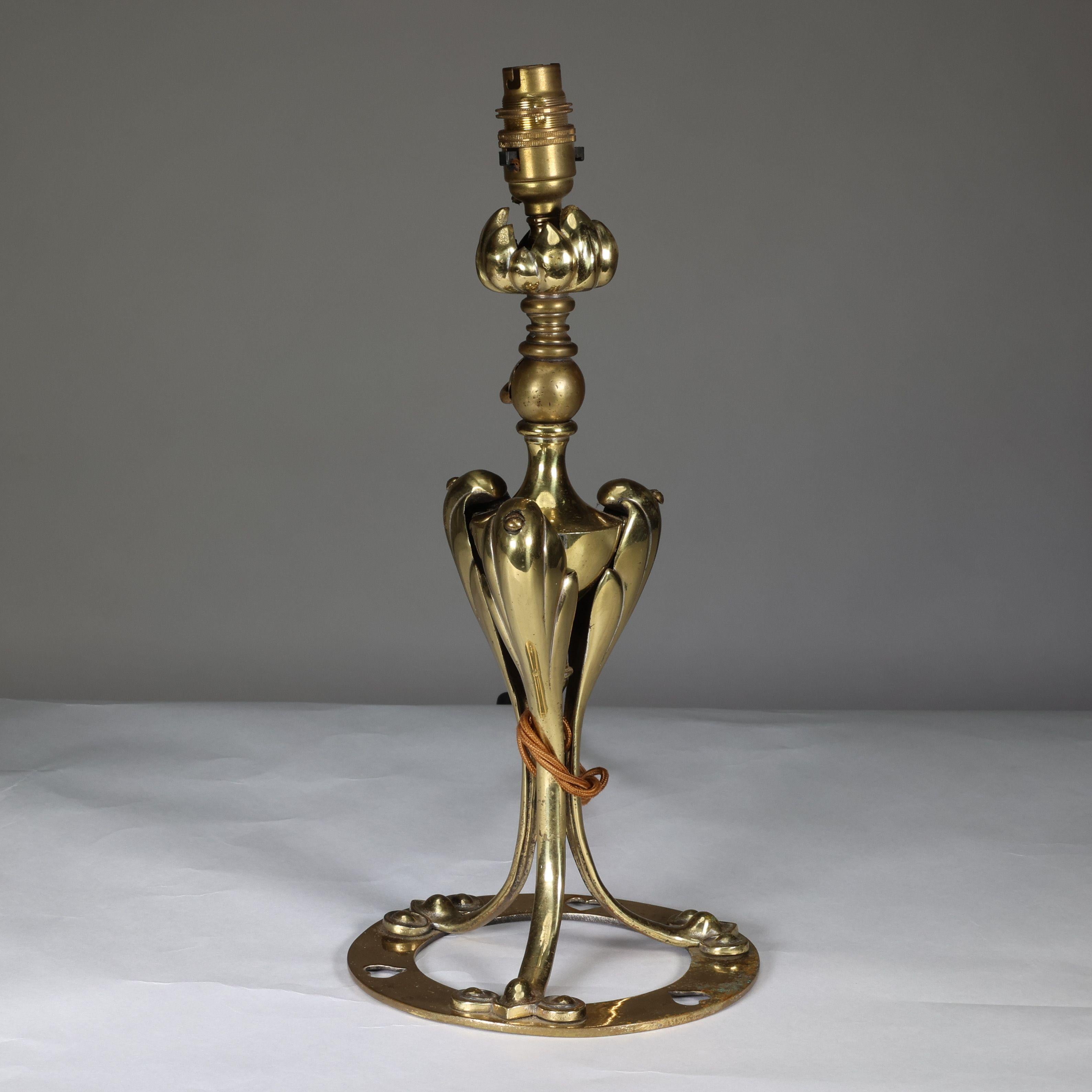 An Arts & Crafts brass table lamp tulip shaped with heart cut-outs to the base In Good Condition For Sale In London, GB