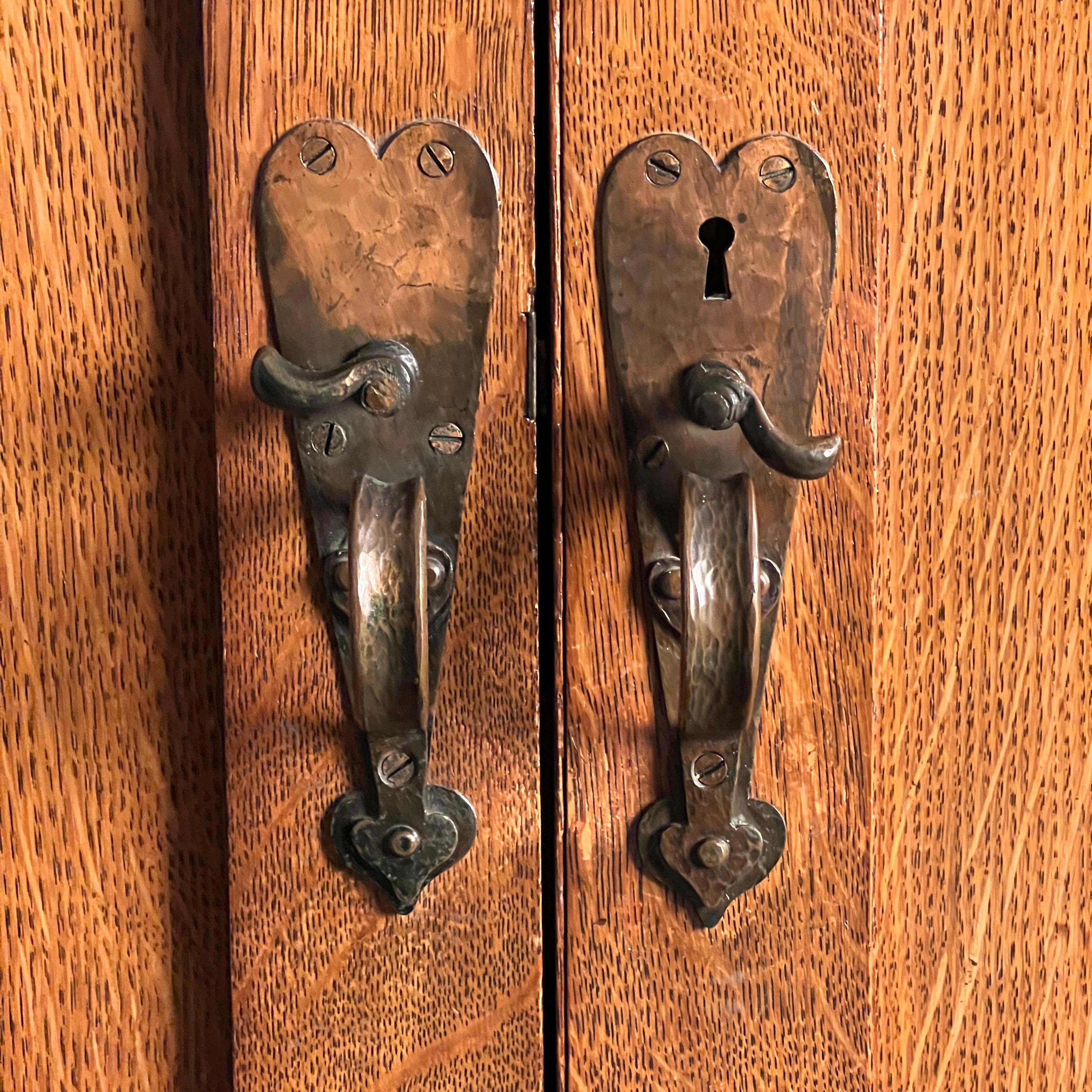 An Arts & Crafts Oak Linen Press In The Manner Of Liberty London For Sale 6