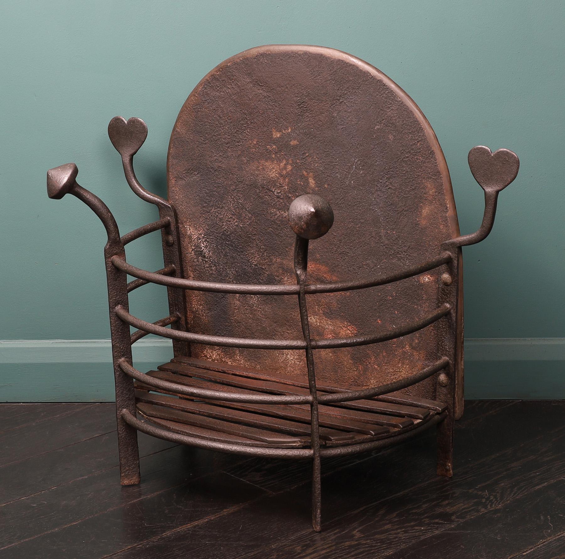 Other An Arts & Crafts Semi-Circular Wrought Fire Basket with Heart-Shaped finials For Sale
