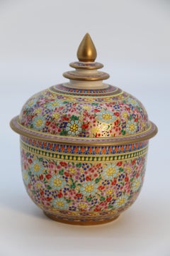 An Asian Siam pottery gilt and enamelled lidded jar circa 1920