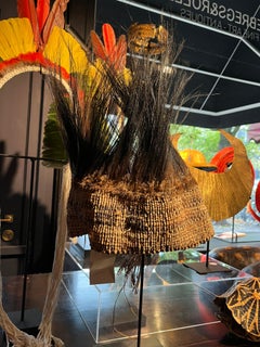 An Asmat headdress decorated with cassowary feathers