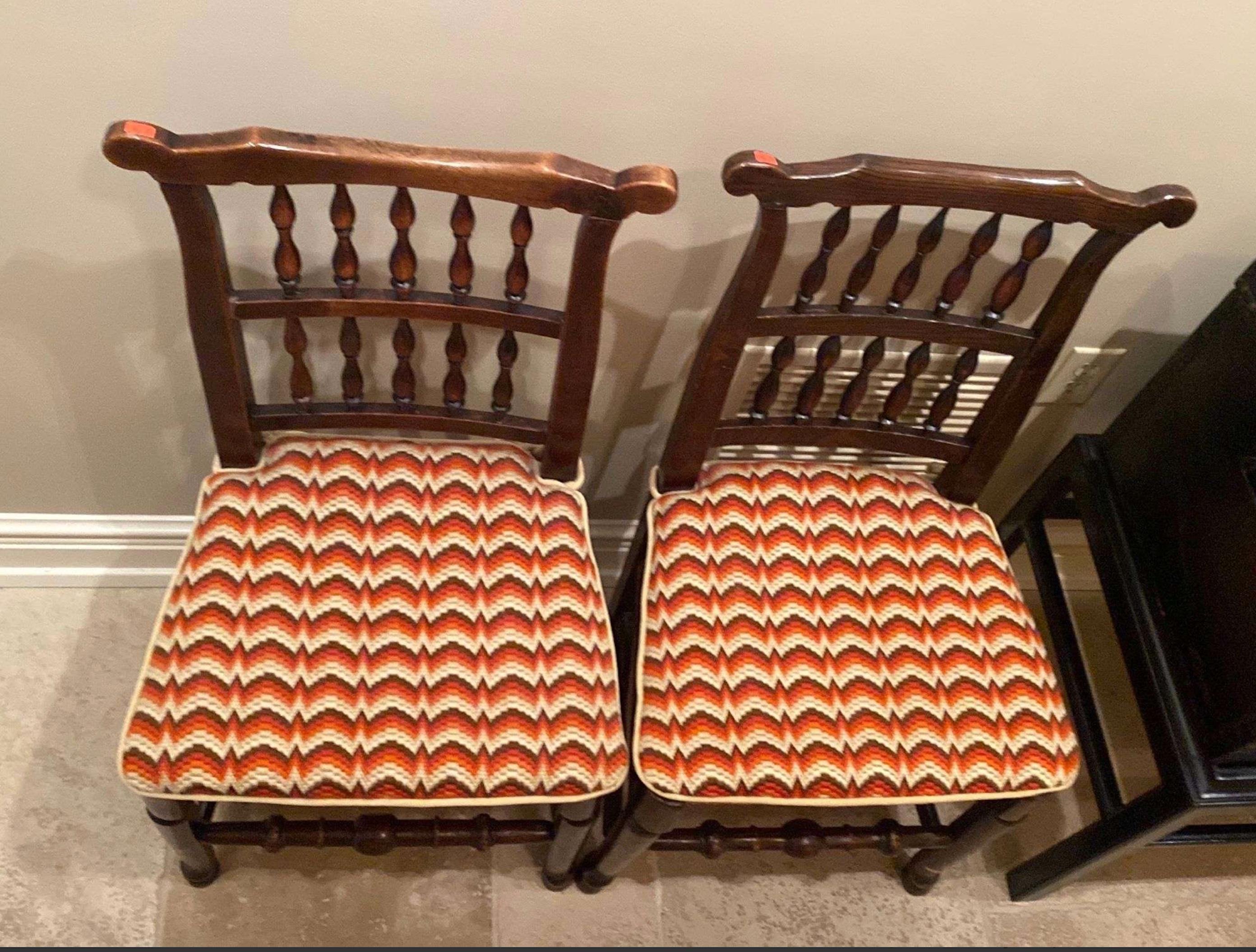 An assembled pair of George III Lancashire side chairs with ladder backs and rush woven seats.  Great color and patination. Priced Per Chair.