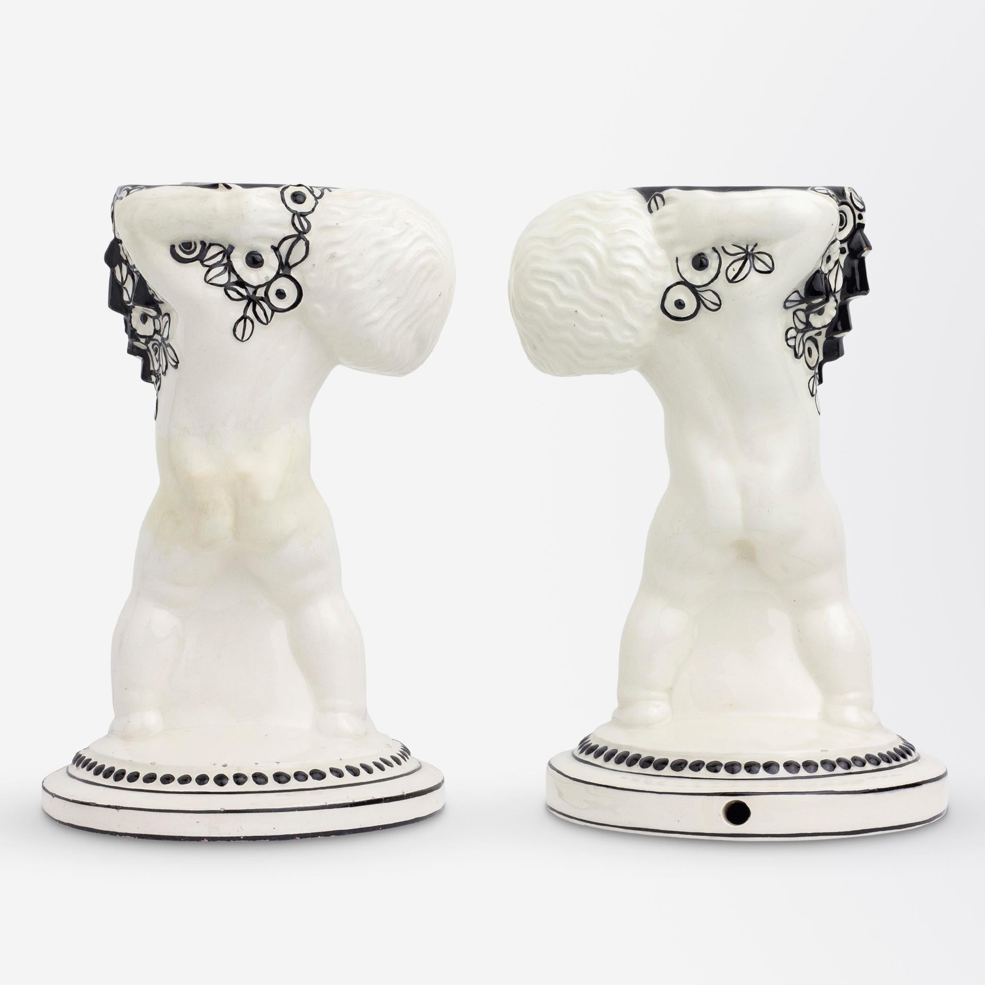 Austrian An Assembled Pair of Putti Candle Holders by Michael Powolny For Sale
