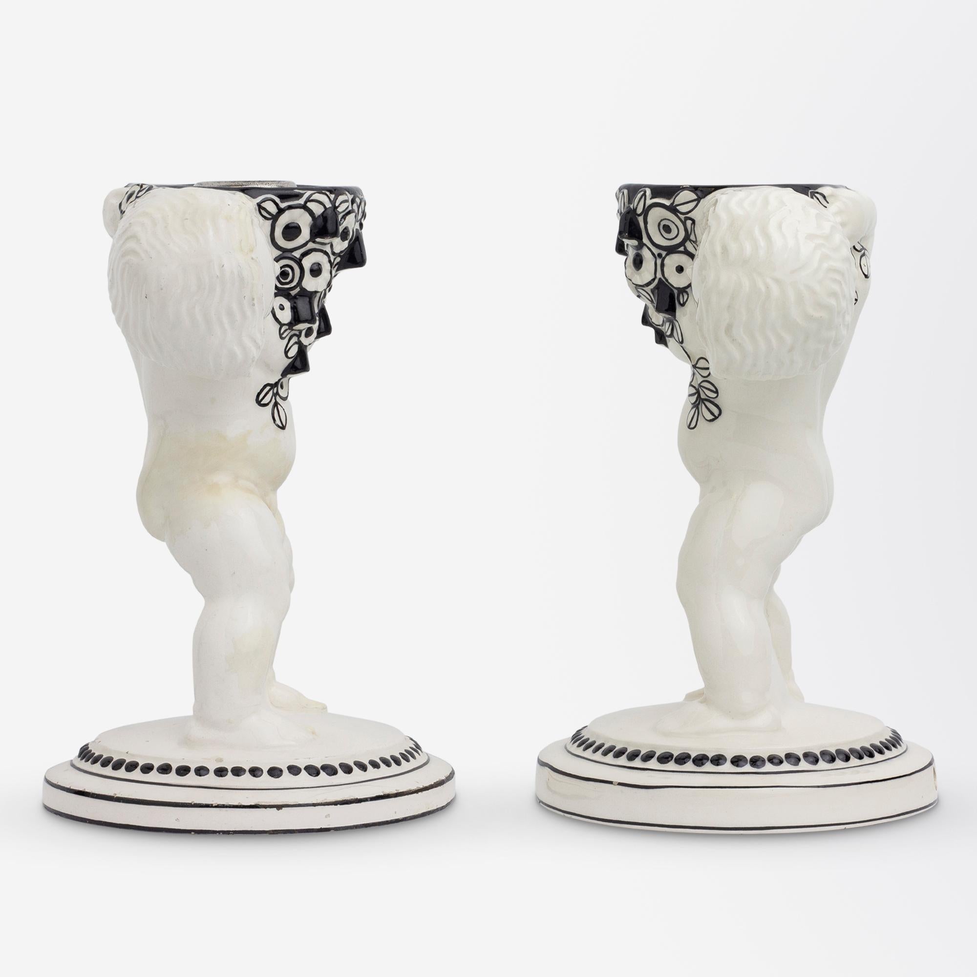 An Assembled Pair of Putti Candle Holders by Michael Powolny In Fair Condition For Sale In Brisbane, QLD