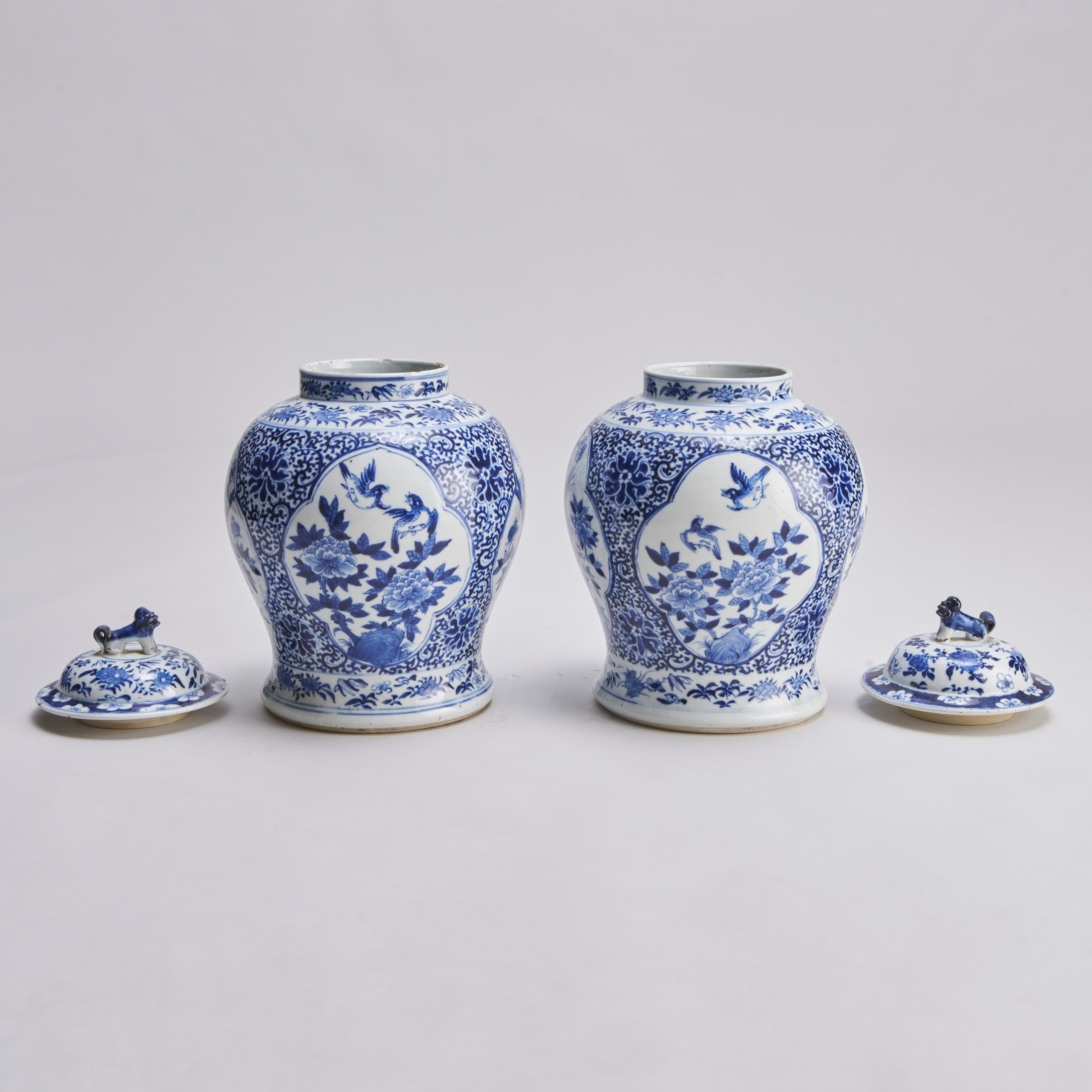 Porcelain An attractive 19th Century pair of blue and white covered jars For Sale