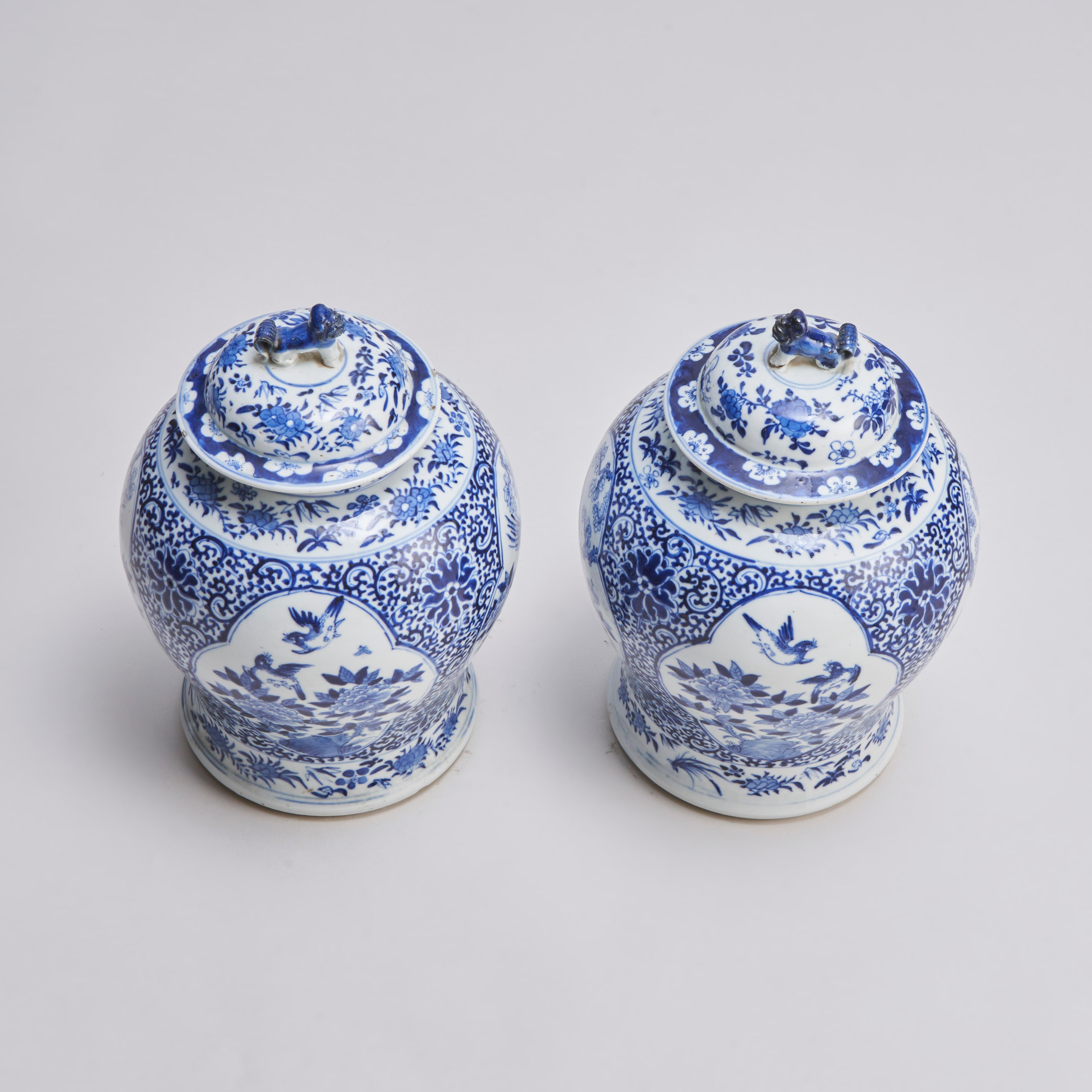 An attractive 19th Century pair of blue and white covered jars For Sale 1