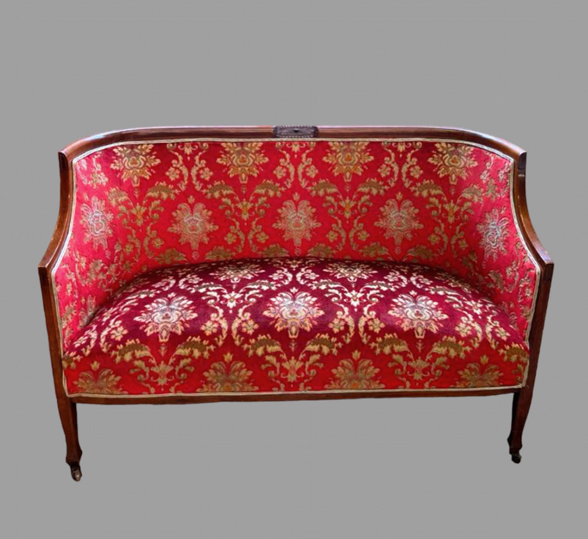 An Attractive Edwardian Wooden Framed Settee with inlay and matching Tub Chair both on castors with original colourful fabric and addition of dark gold silk double piping.

Settee Height 83 cm, Width 123 cm , Depth 63 cm and Seat Height 45 cm

Chair