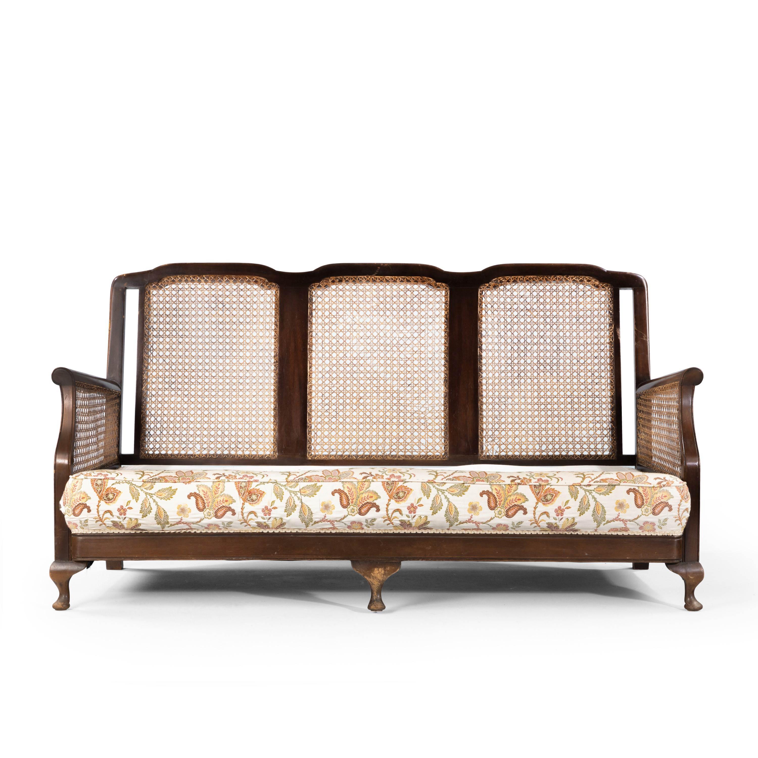 An attractive bergère three pillar sofa in a mahogany and canework frame. The canework in excellent overall condition. The sofa was recovered in 2017 and in a top quality linen fabric and has not been used since.
Measures: Seat height 23