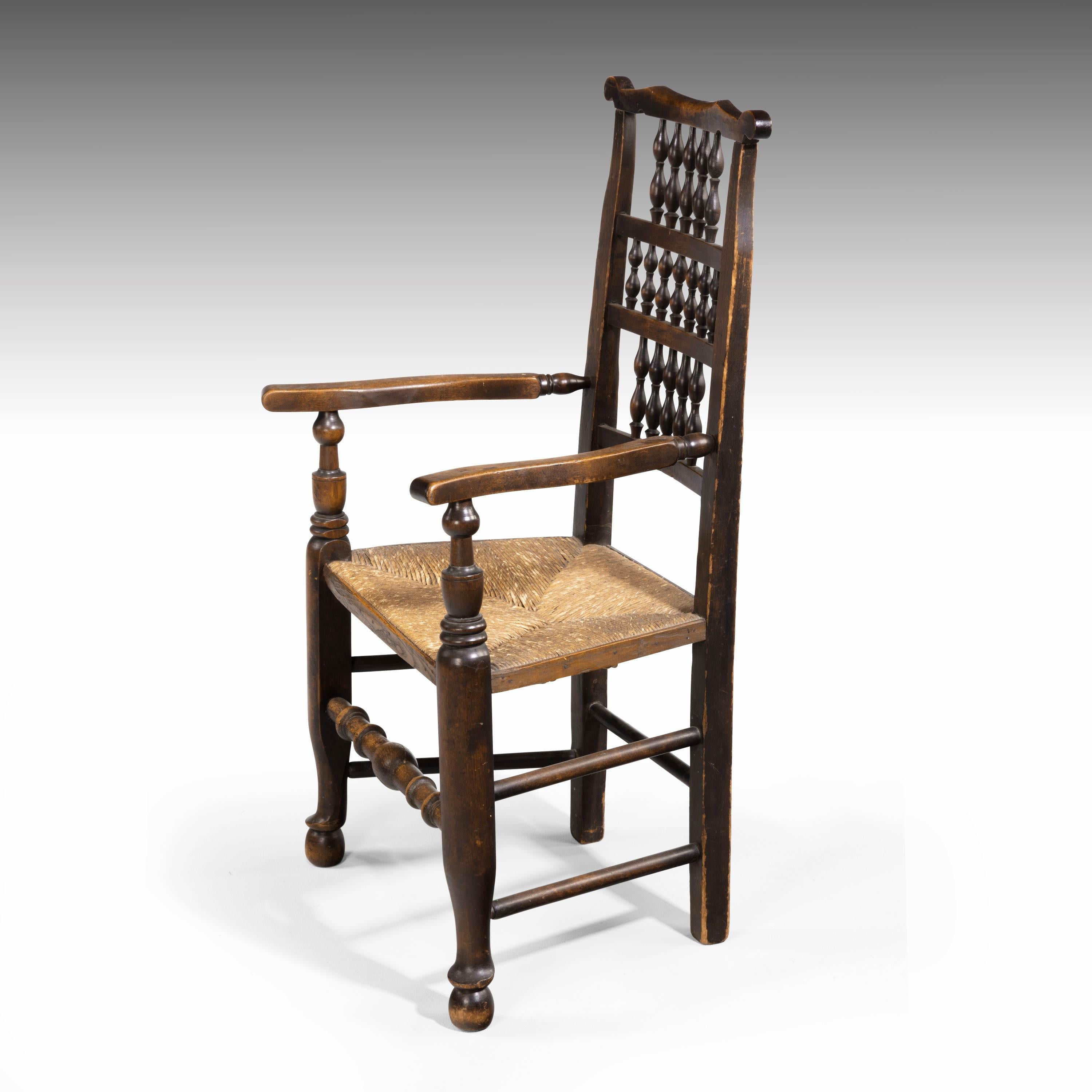 English Attractive Mid-19th Century Elm Spindleback Armchair