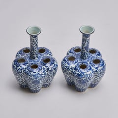 An attractive pair of 19th Century Chinese blue and white crocus vases