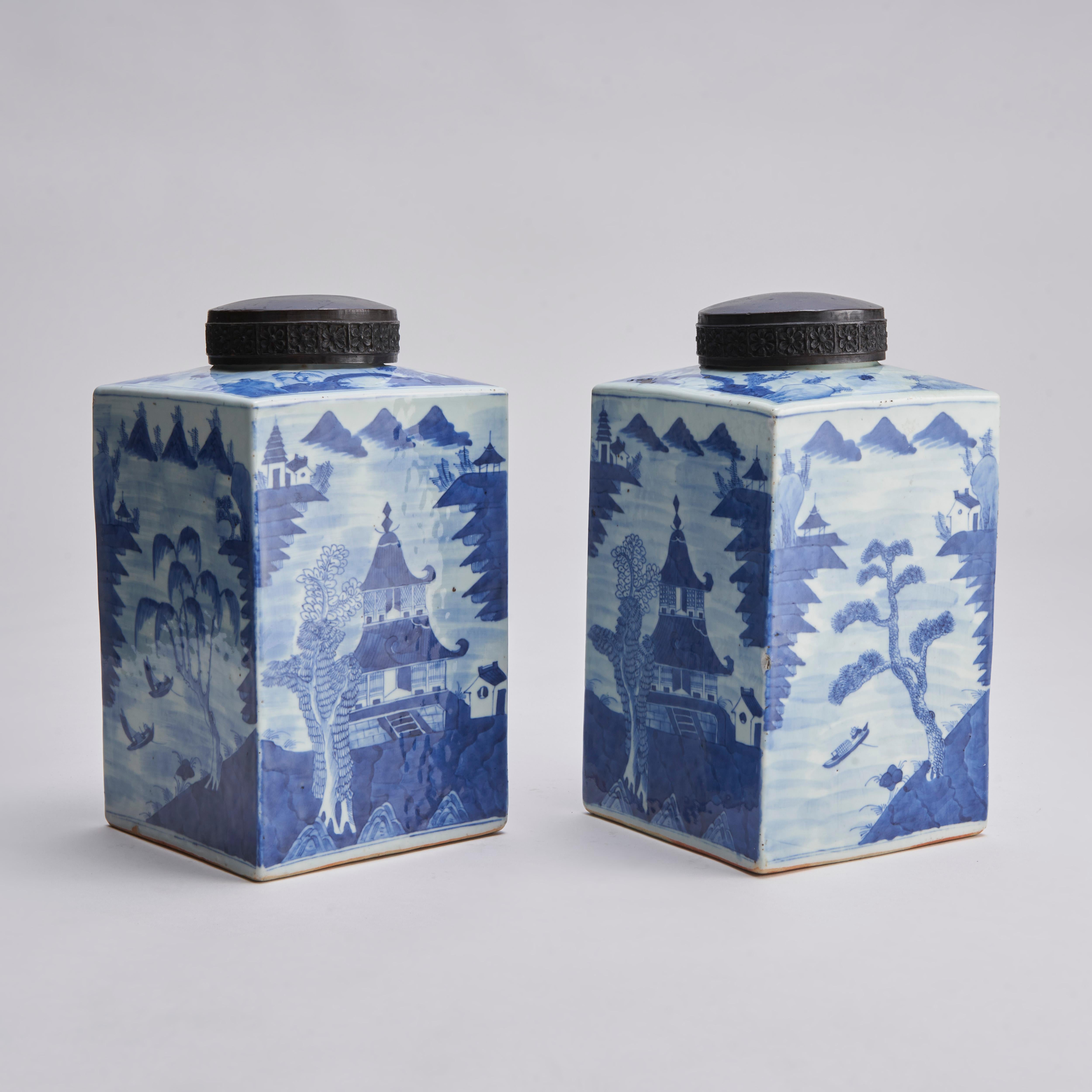 Porcelain An attractive pair of Chinese porcelain blue and white tea jars (Circa 1800) For Sale