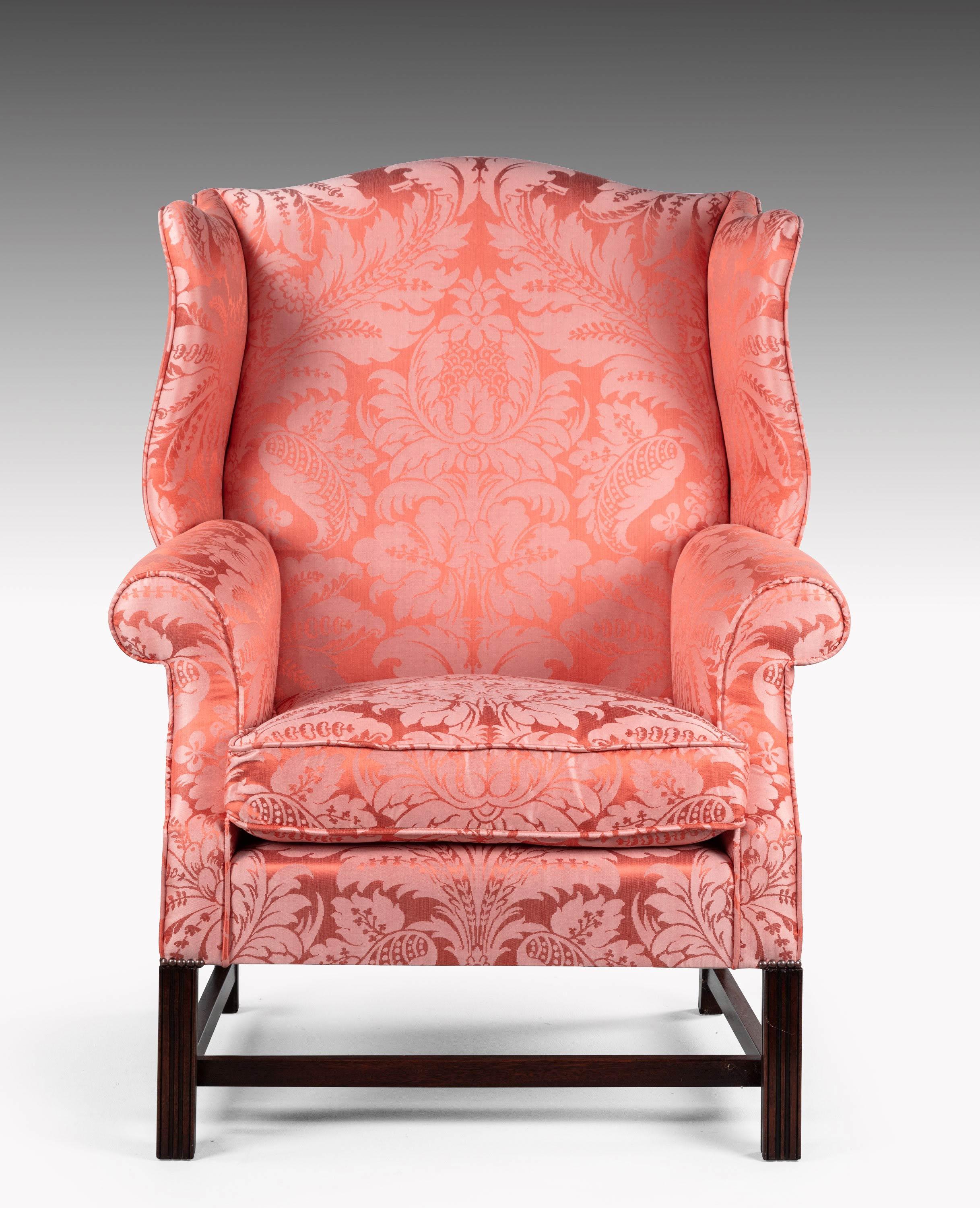 An attractive pair of mahogany framed wing hairs of typical Chippendale design. Manufactured in our won workshops and beautifully upholstered in the traditional manner. The current cover being one of a Gainsborough silk damask.
Measures: Seat