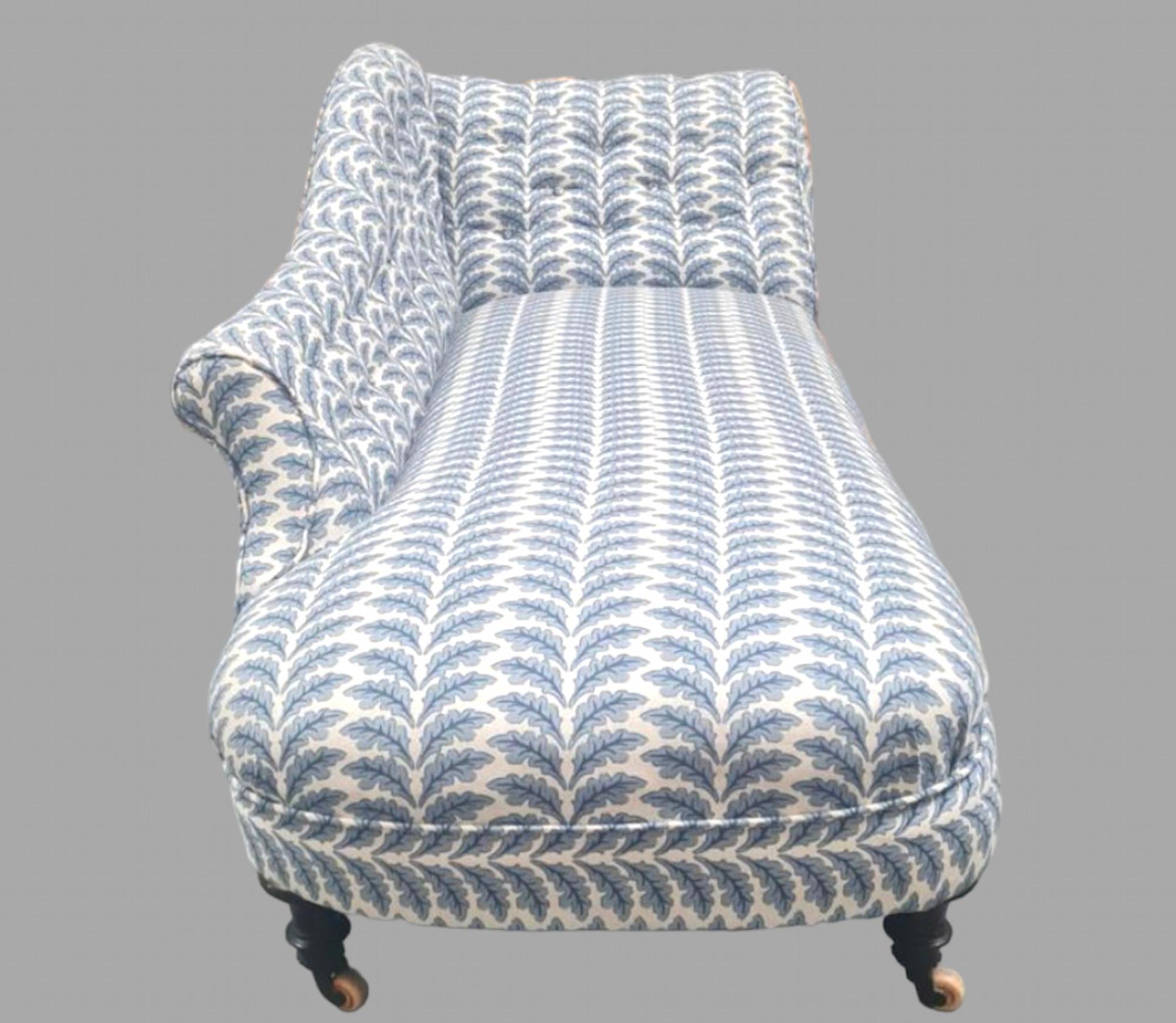 A very Attractive Button Back Victorian Chaise Longue on turned legs and castors that has been professionally reupholstered in a beautiful linen.