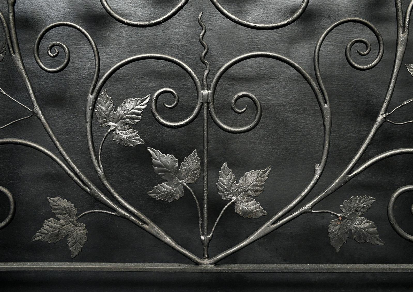 An attractive wrought iron firescreen. The shaped, scrolled feet surmounted by fine leaf work and scrolls to central frame. Additional mesh behind could be added if required within price. English, circa 1900.

Height:	636 mm      	25