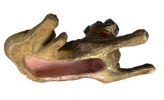 An Austrian Painted Terracotta Model of a Recumbent Bull Dog