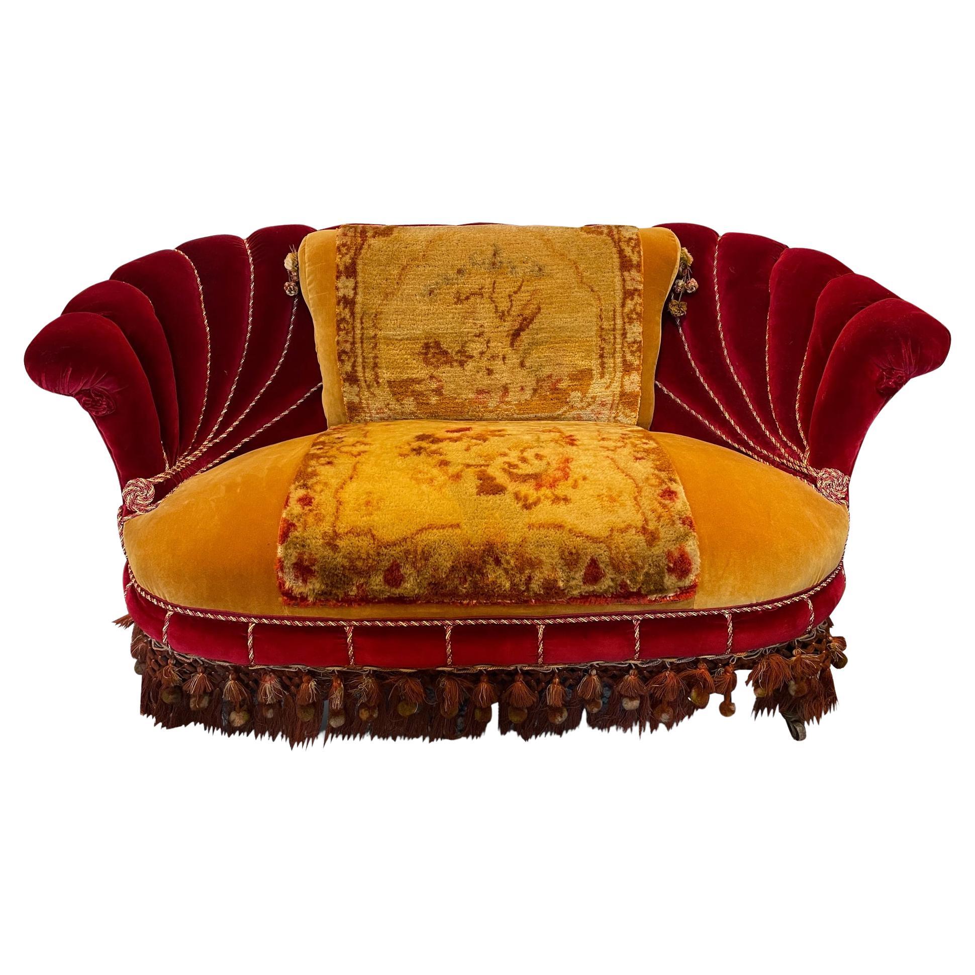A beautiful Austro Hungarian shell shaped two seater sofa , using some original fabric with red velvet damask by GP&J Baker and gold braiding added. 1927.