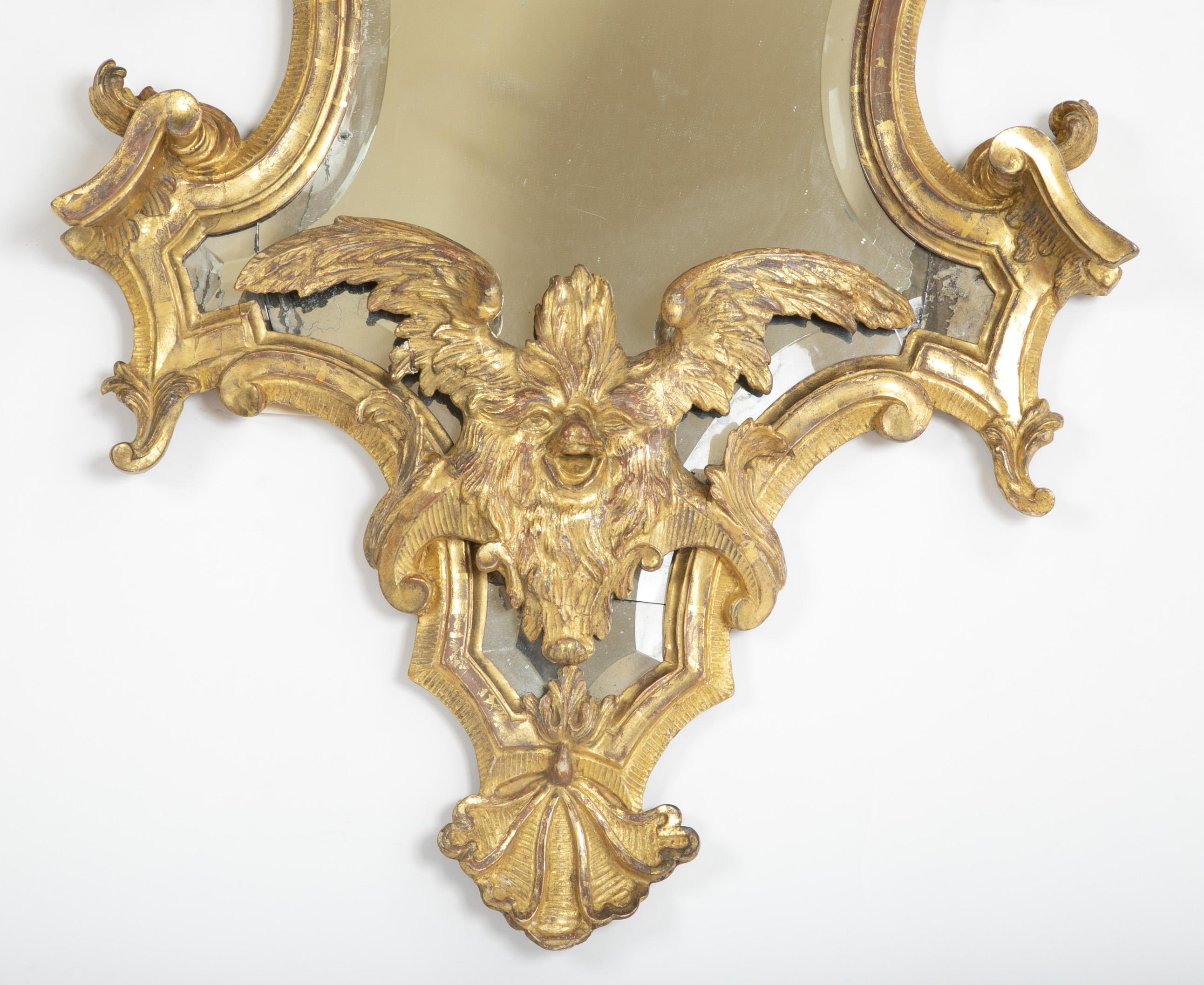 Giltwood Baroque Italian Mid-18th Century Gilt Mirror with Faces