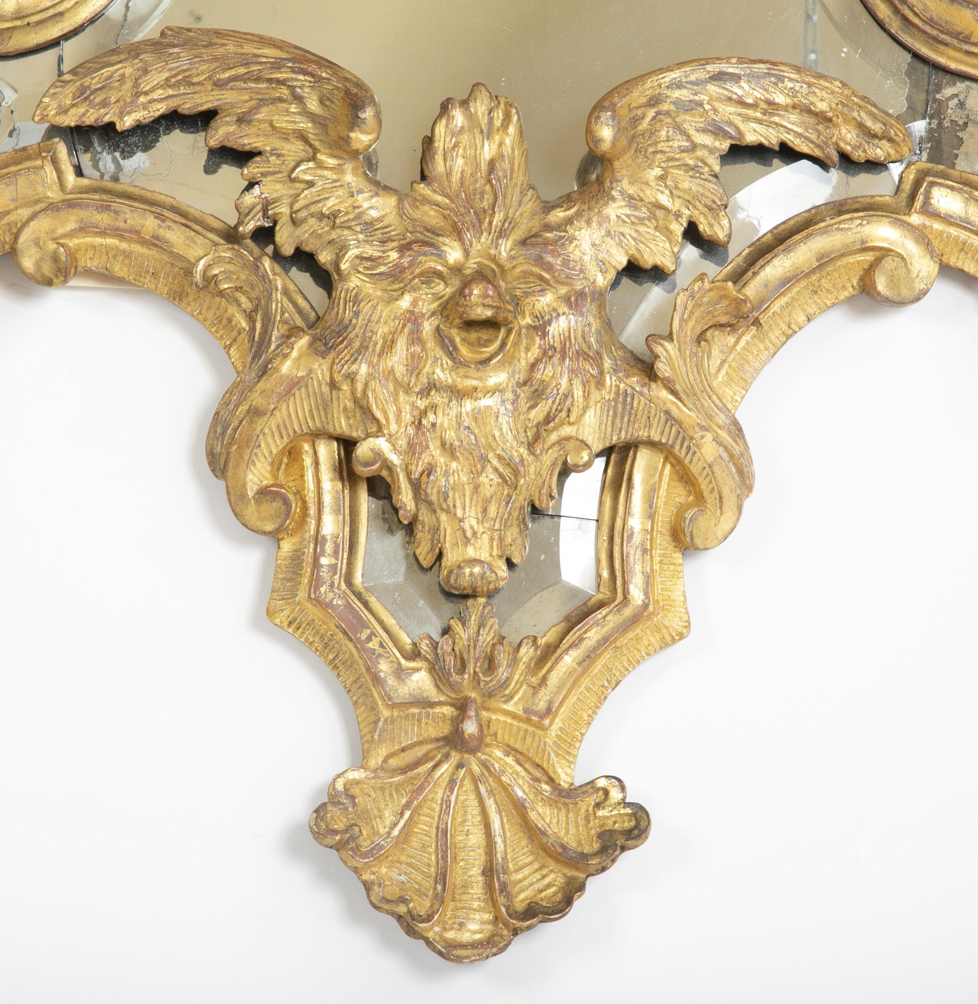 Baroque Italian Mid-18th Century Gilt Mirror with Faces 1