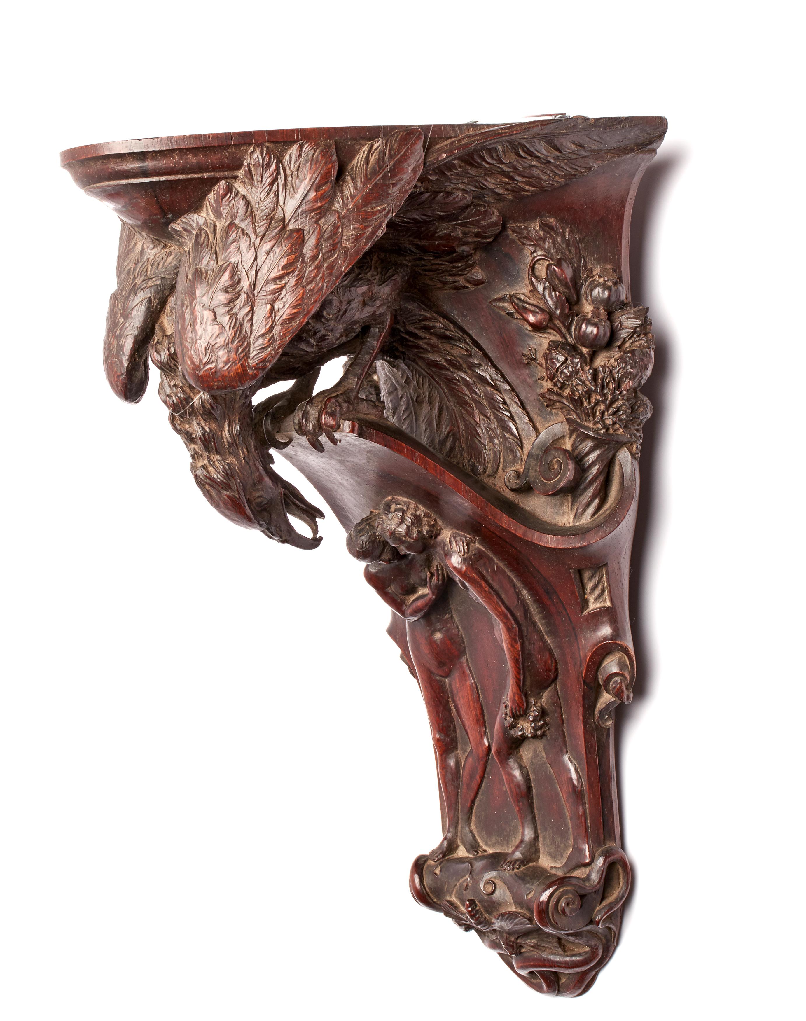 Little shelf, carved rosewood, depicting an eagle watching Adam, Eve and a bee. G.Benelli, 1831, Italy, circa 1880.
