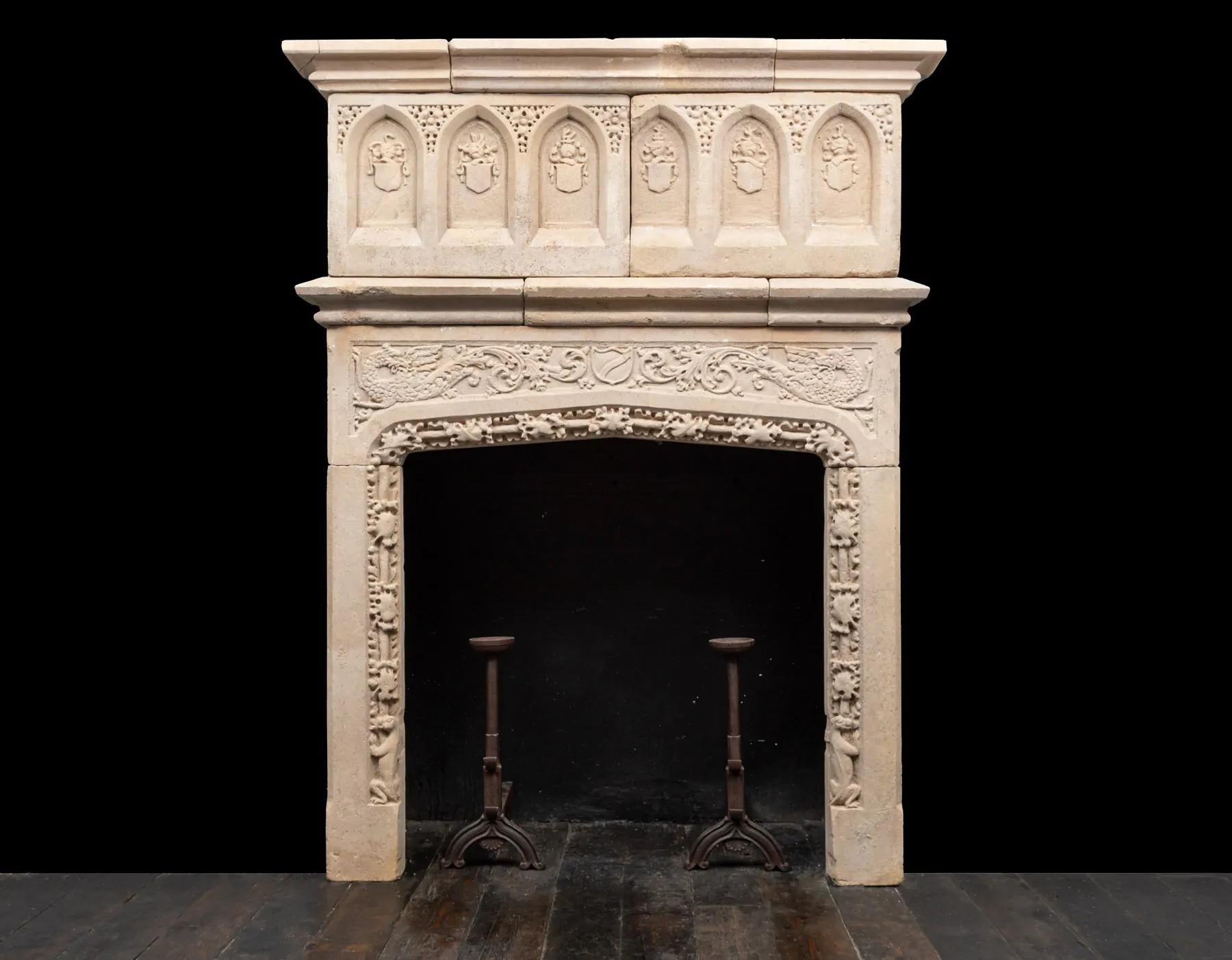 An early 17th century English Jacobean period Bath-stone chimneypiece  
An extremely old and rare carved stone fireplace surround salvaged from a London property. 

Carved in a buff/honey coloured Bath-stone with mythical creatures, foliate