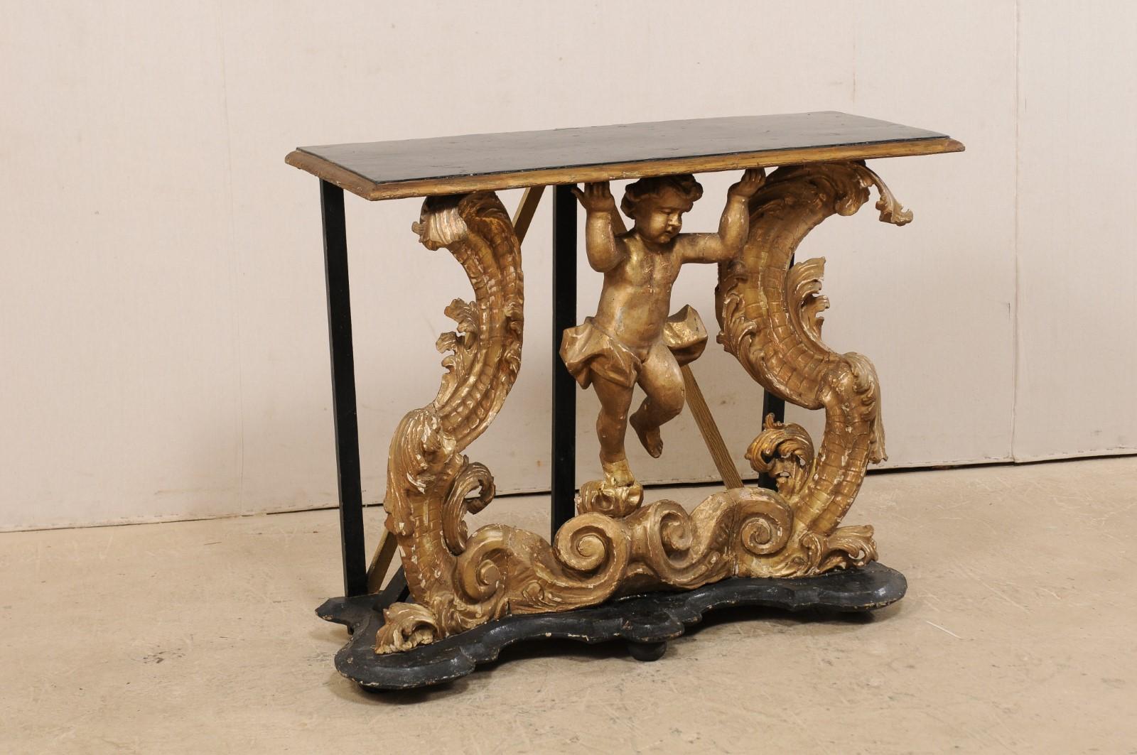 Hand-Carved Early 18th Century Italian Rococo Console Table with Beautifully Carved Putto For Sale