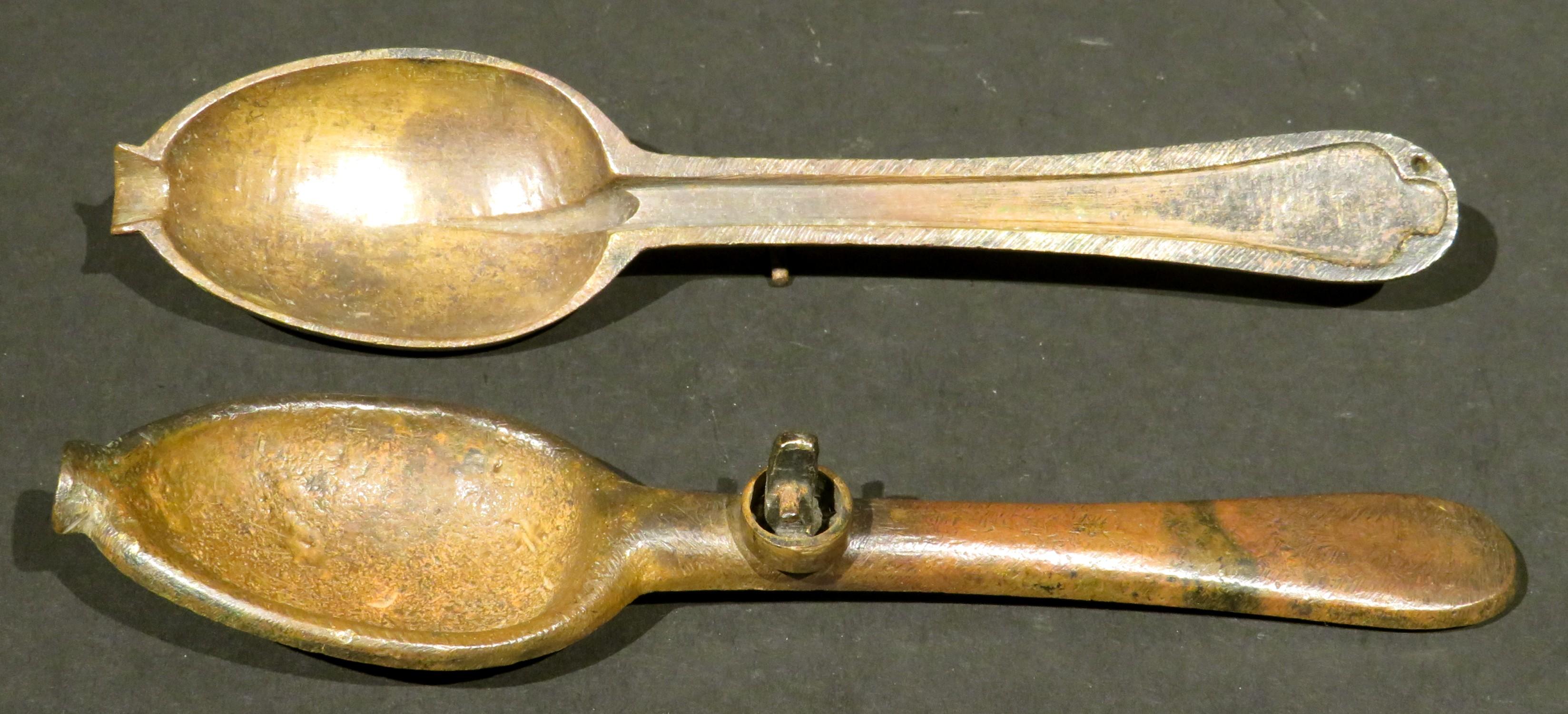 An early 18th century bronze spoon mould comprised of 2 halves that form a spoon mould for a Hanoverian 'rat-tail' dog nose tablespoon. Both halves exhibiting a very old untouched surface & patina both inside and out. 
Spoon moulds were originally