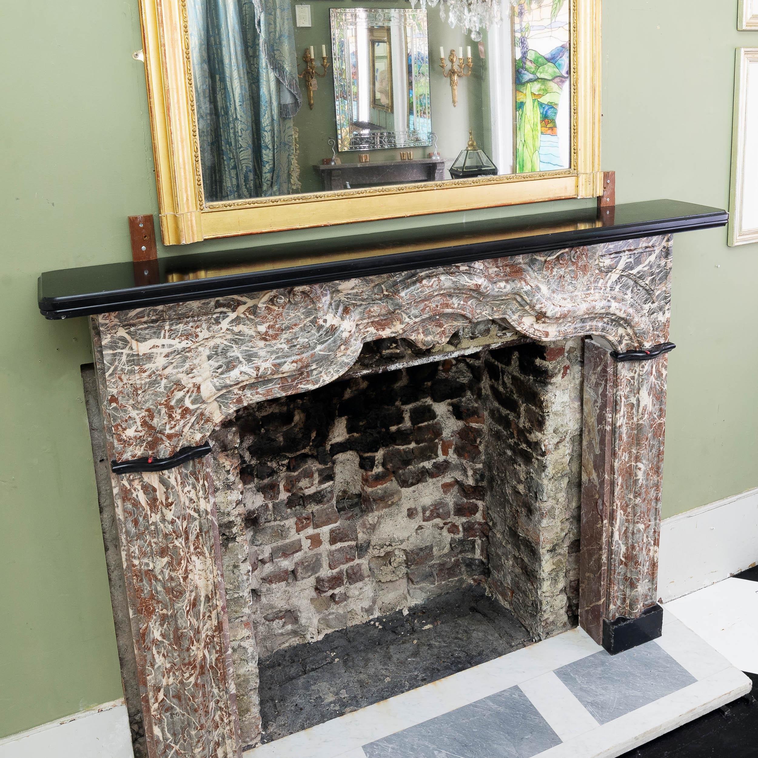 An Early 18th Century French Rance Marble Fireplace For Sale 16