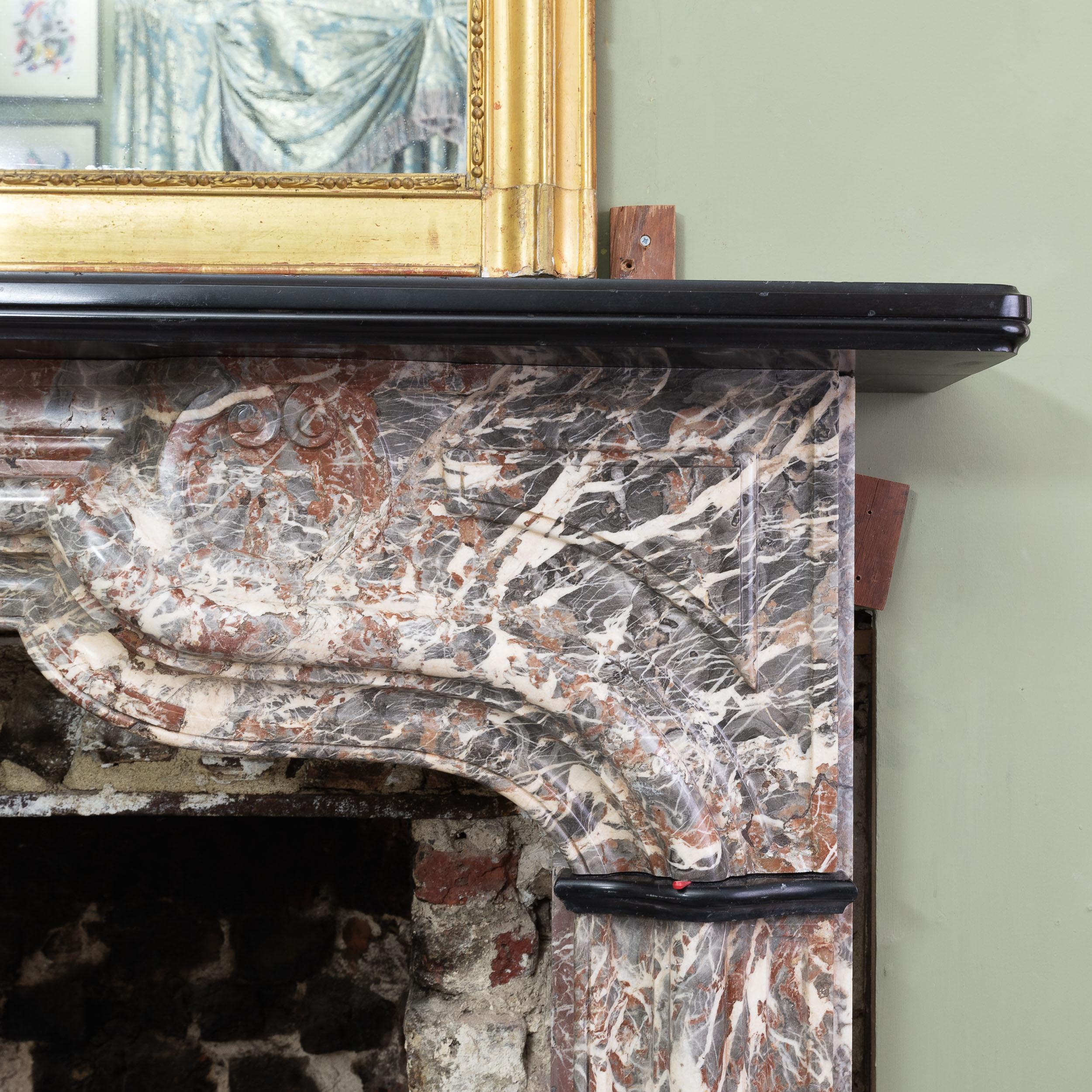 Louis XIV An Early 18th Century French Rance Marble Fireplace For Sale