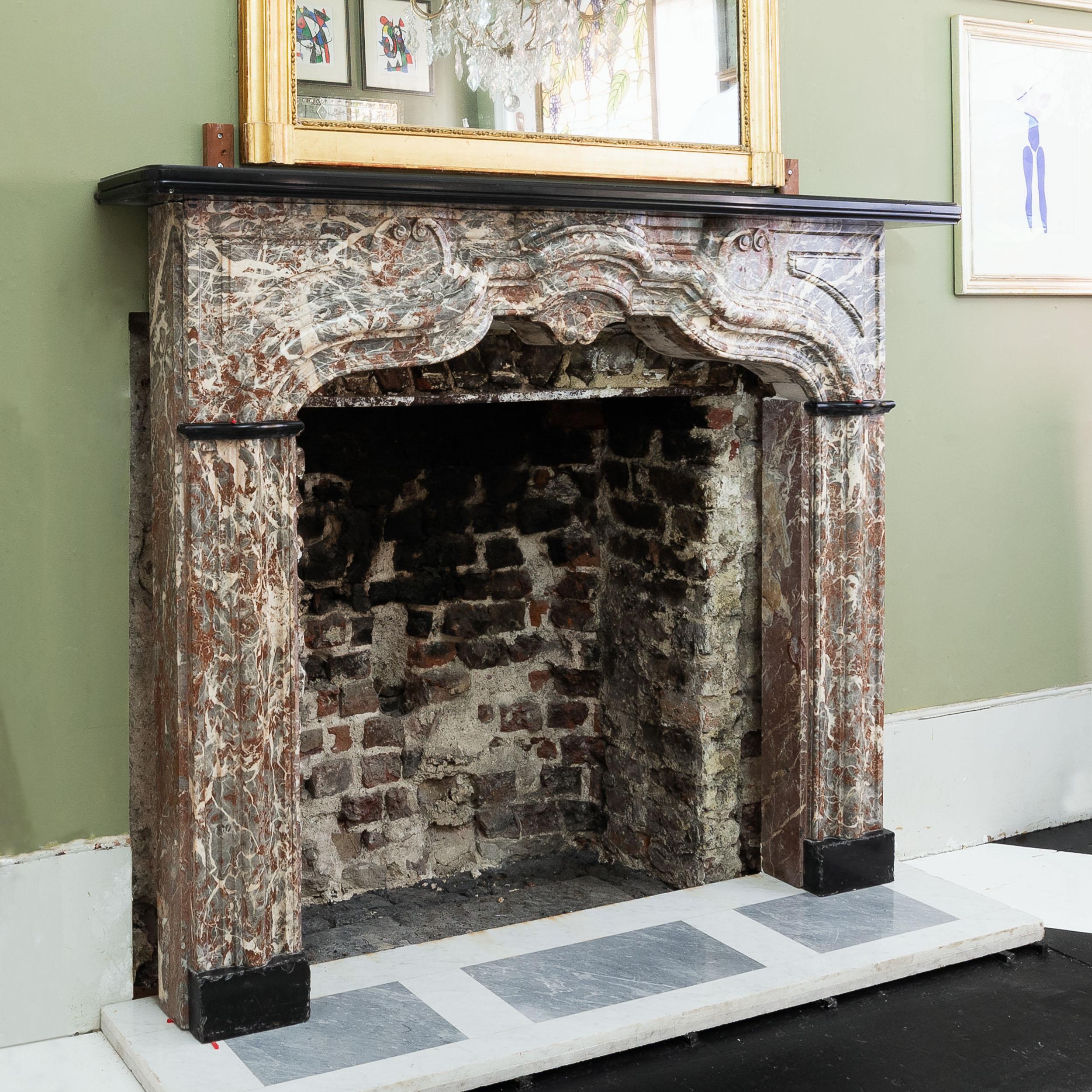 An Early 18th Century French Rance Marble Fireplace For Sale 1
