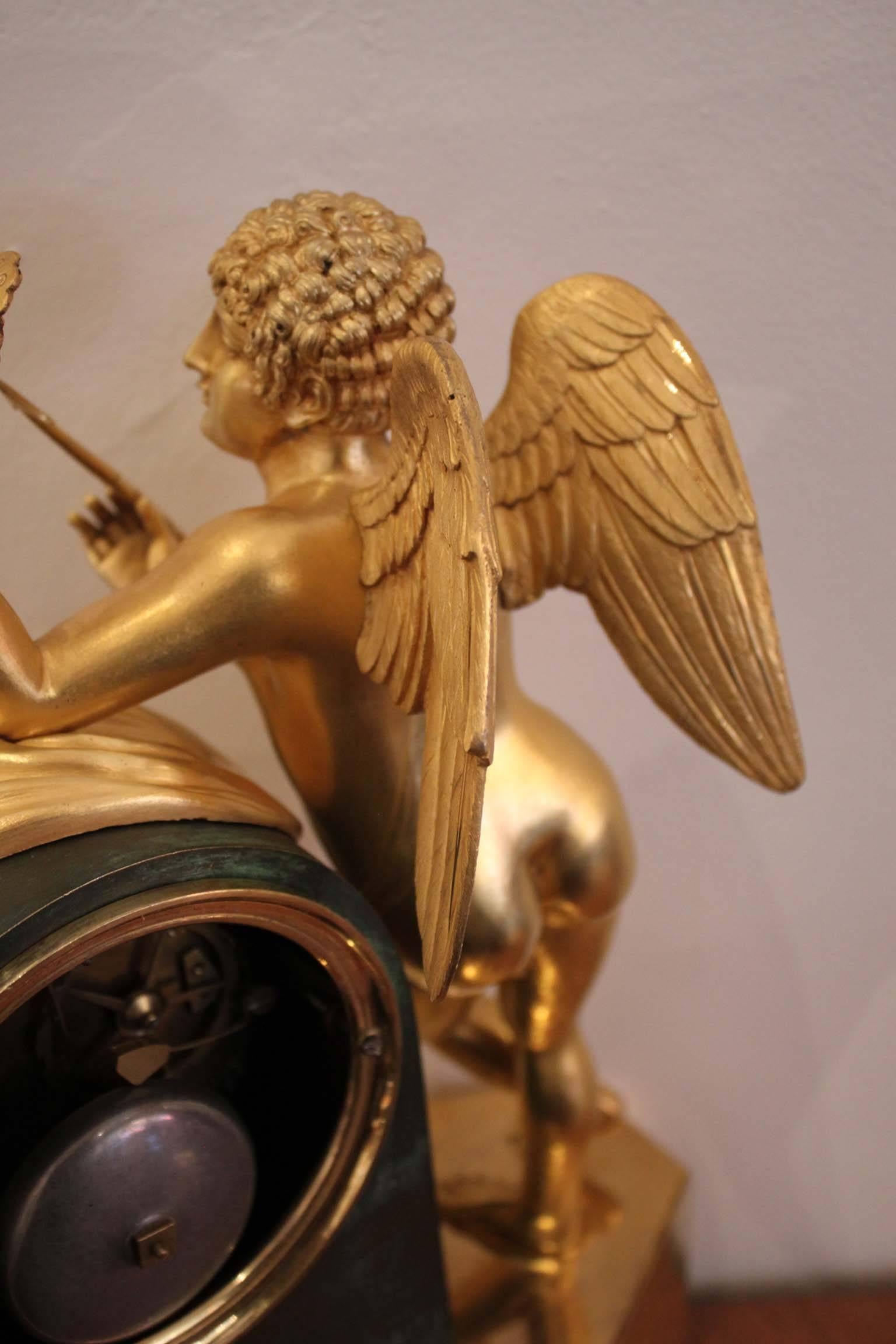 An Early 19th Century Cupidon Gilt Bronze Clock 10