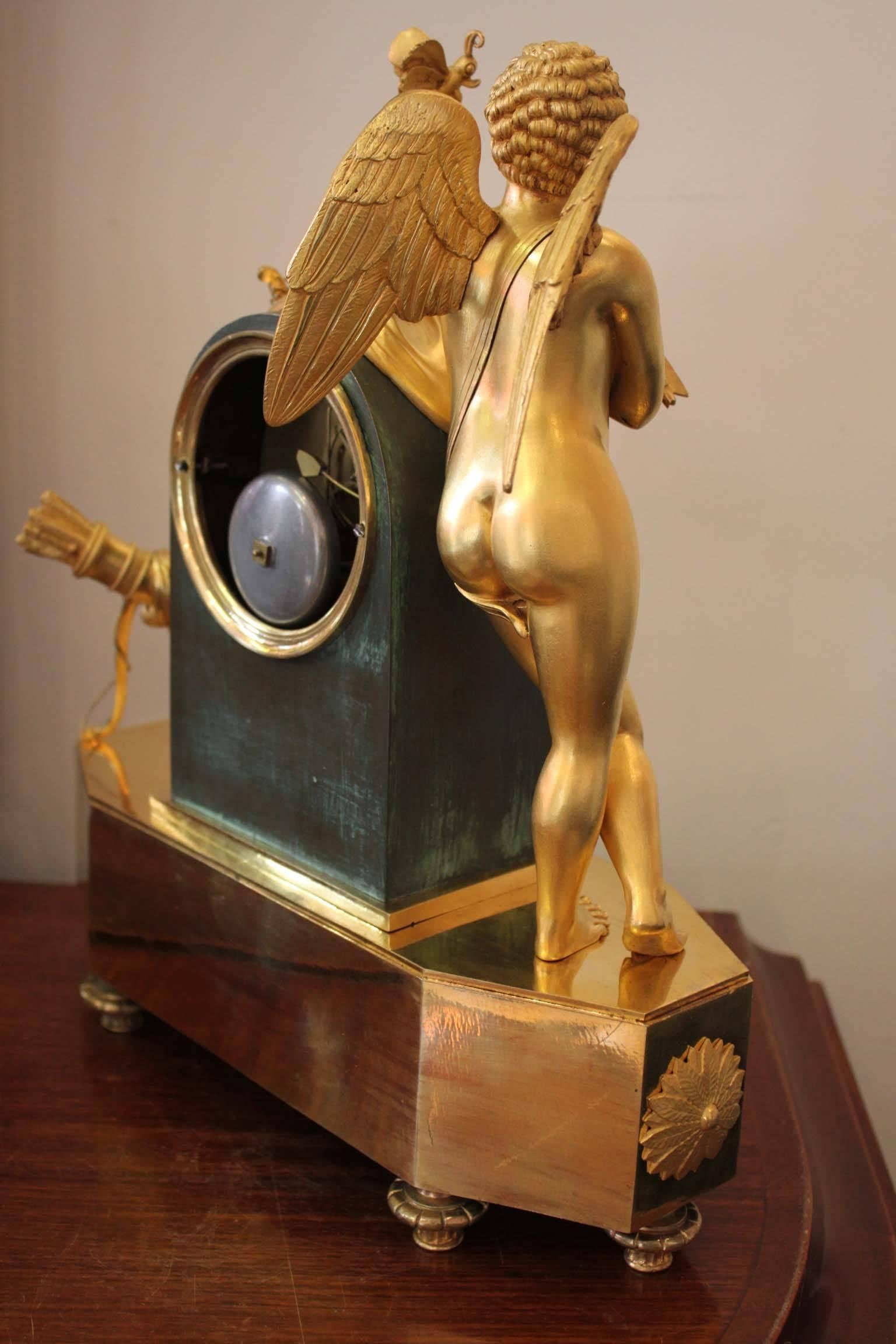 Directoire An Early 19th Century Cupidon Gilt Bronze Clock
