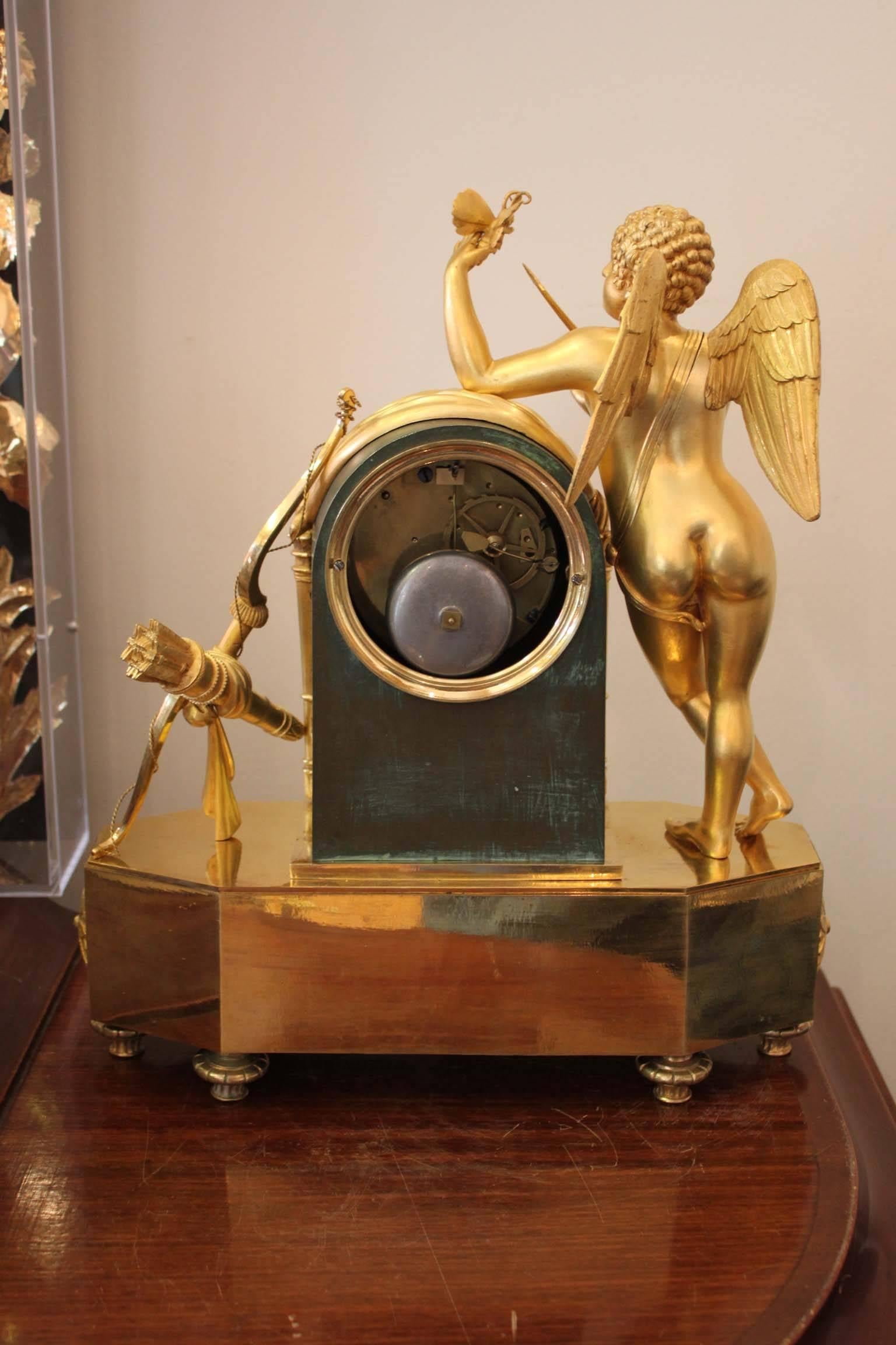 French An Early 19th Century Cupidon Gilt Bronze Clock