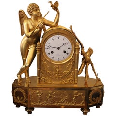 An Early 19th Century Cupidon Gilt Bronze Clock