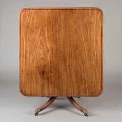 An Early 19th Century George III Period Mahogany Table on Brass Castors