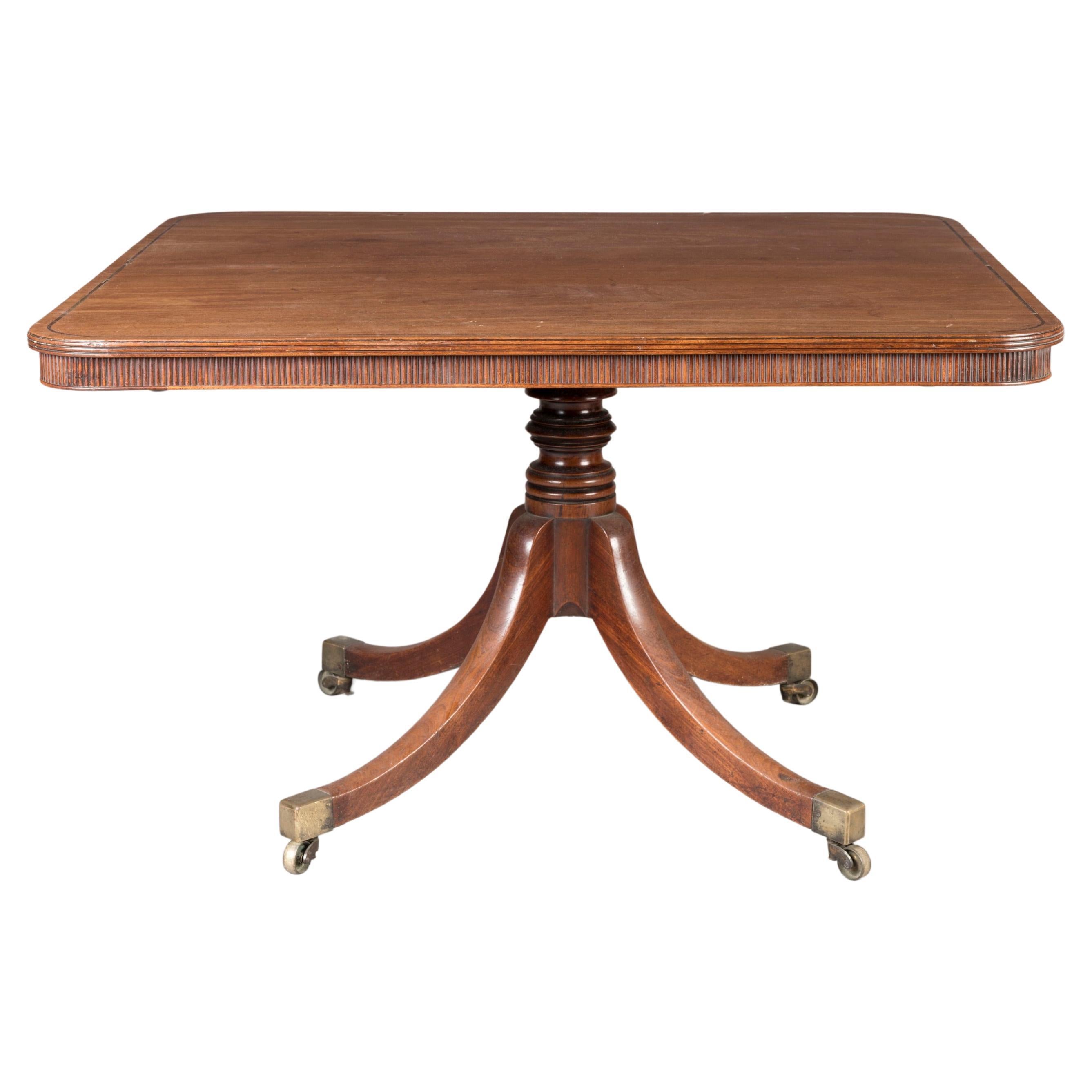 An Early 19th Century George III Period Mahogany Table on Brass Castors For Sale