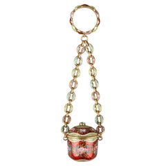 An early 19th century gold and enamel vinaigrette, chain and ring