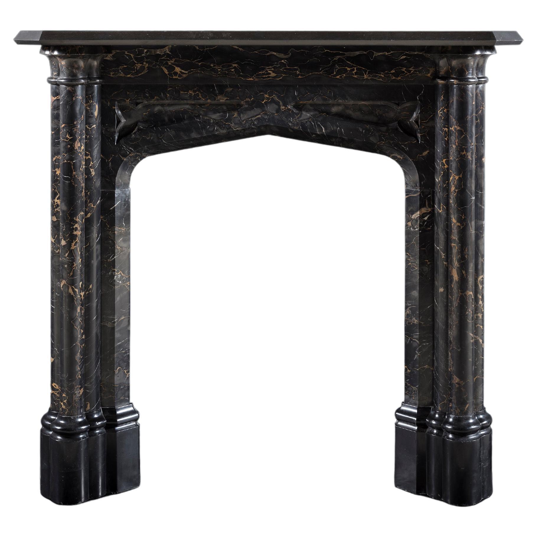 An Early 19th Century Gothic Revival Mantle in Portoro and Belgium Black Marble