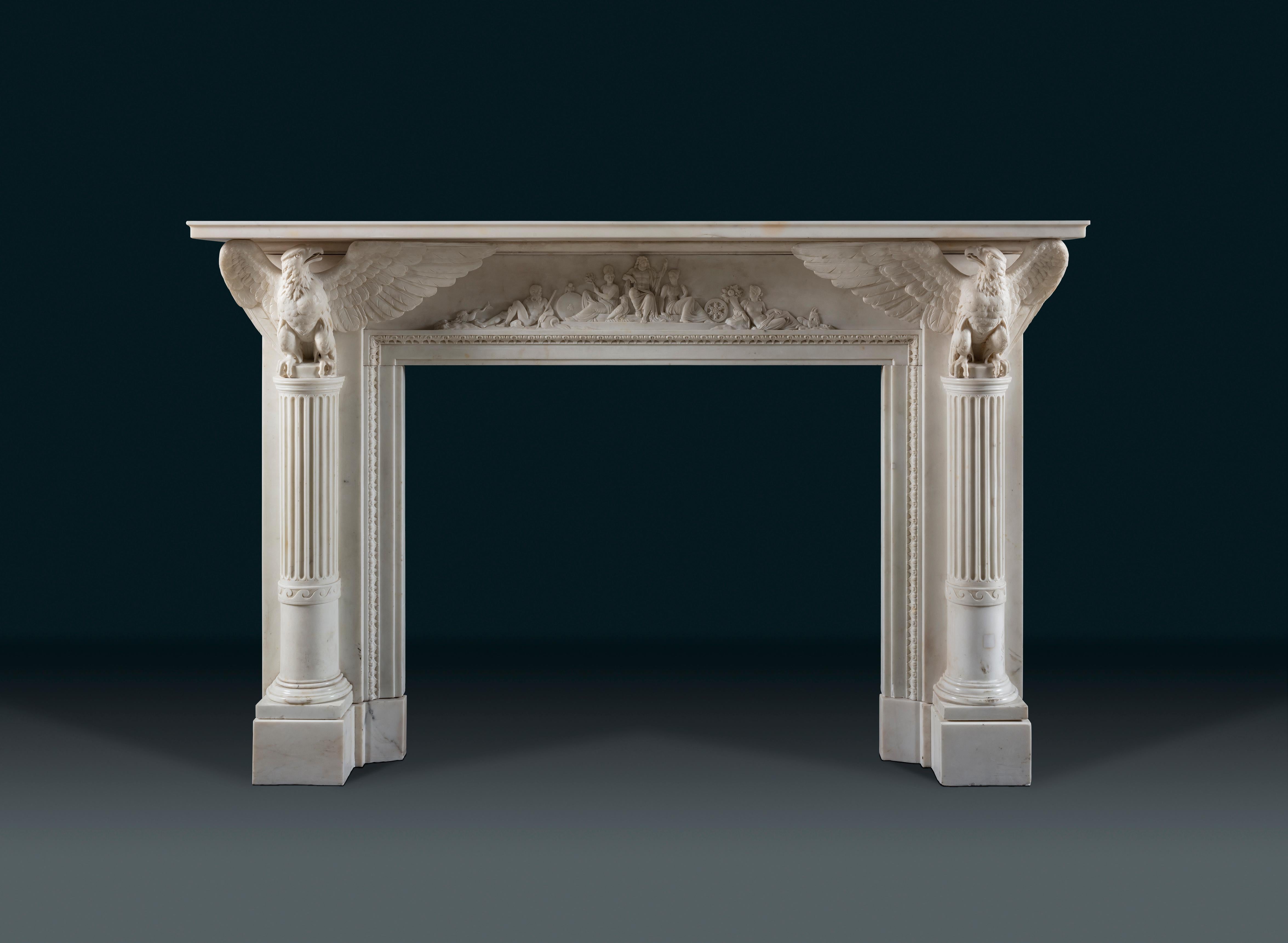 A magnificent early 19th Century statuary marble Irish chimneypiece carved by the Darley Brothers.
The subject of this piece celebrates Zeus, King of Olympus and the Greco-Roman Gods. The shelf upheld by magnificent Imperial eagles, which gesture