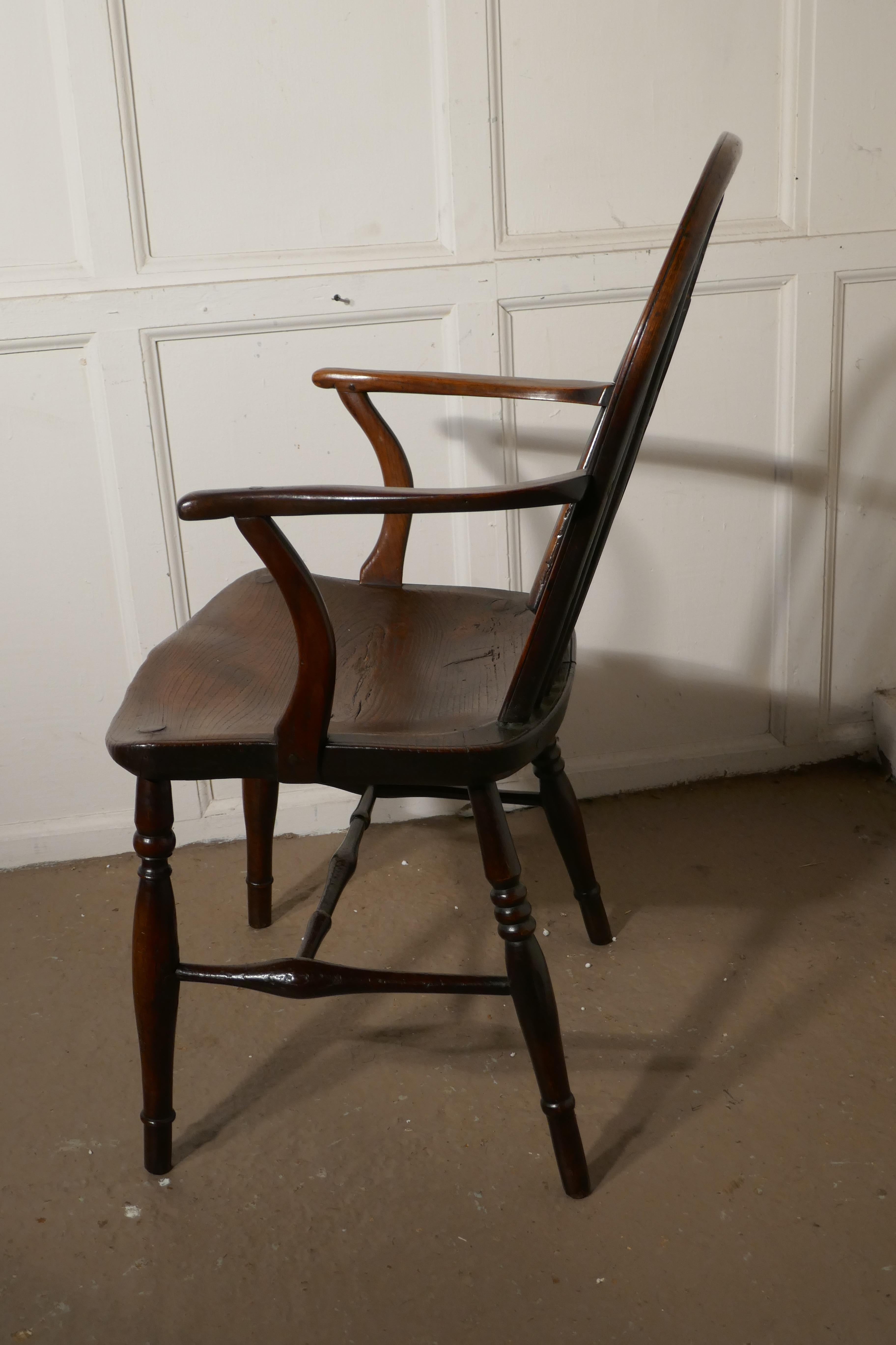 19th Century Early 19th Elm Wheel Back Carver Chair