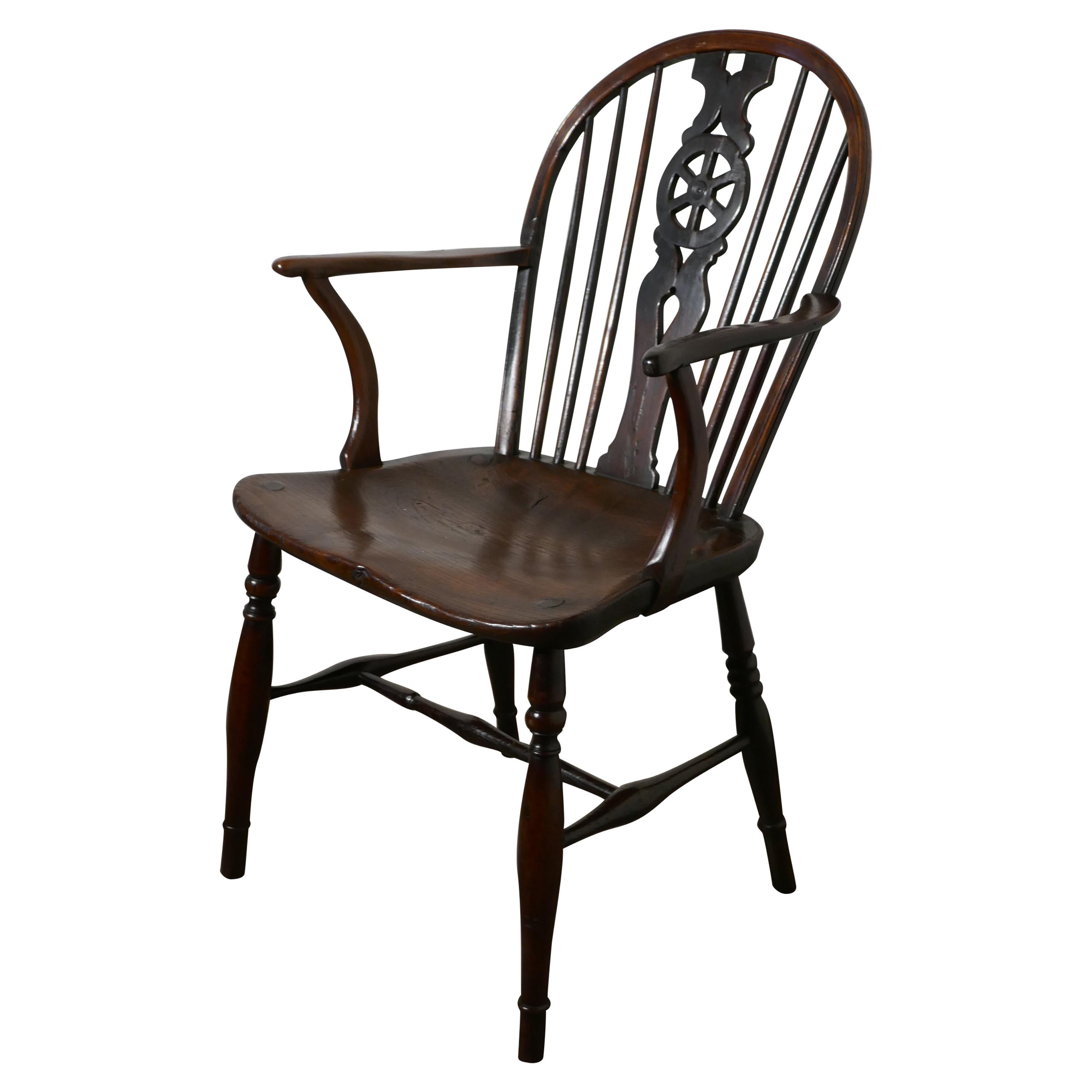 Early 19th Elm Wheel Back Carver Chair
